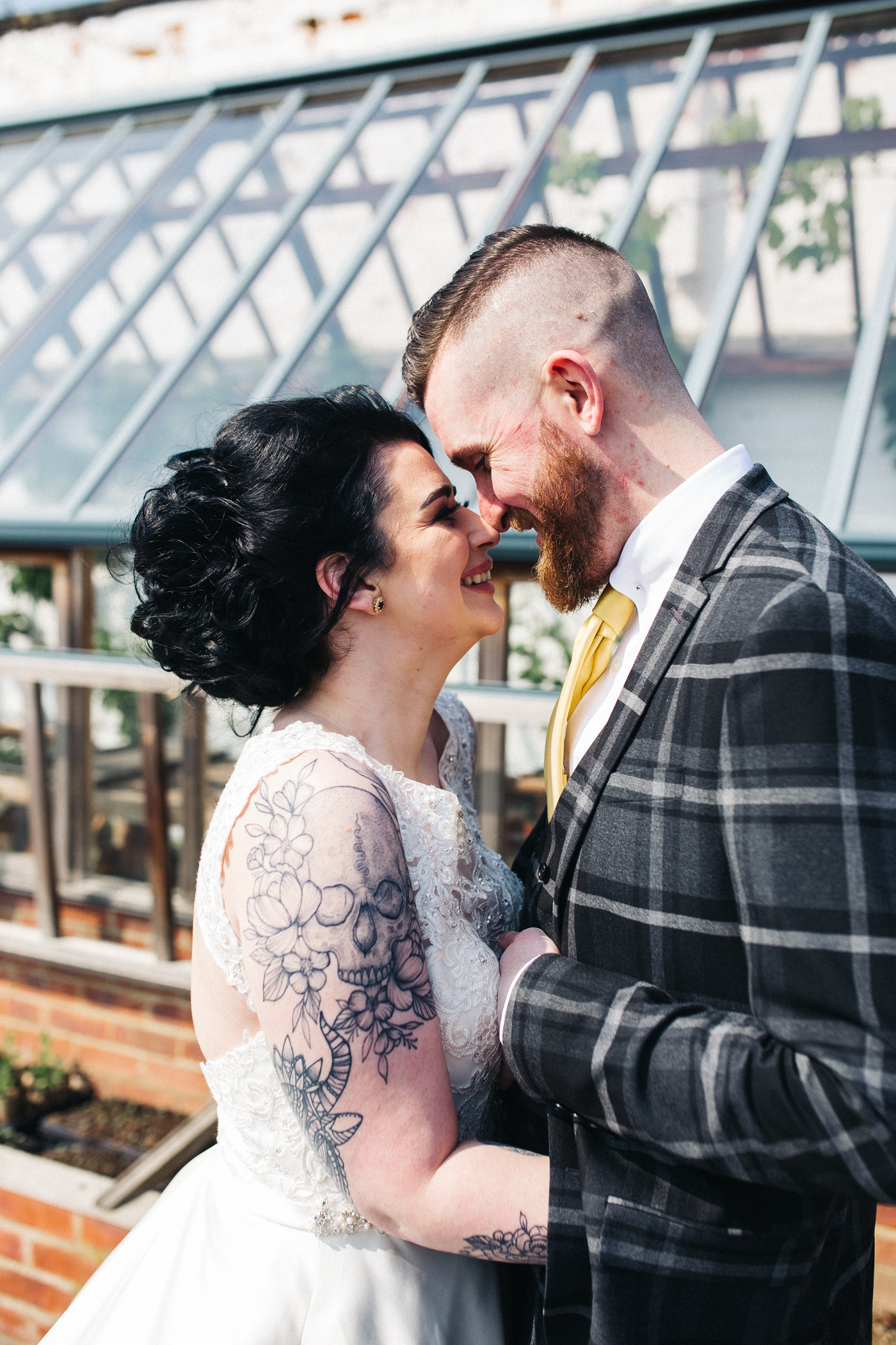 the bride and groom stand and look at each other closely. preston park museum wedding stockton teesside middlesbrough wedding photographer