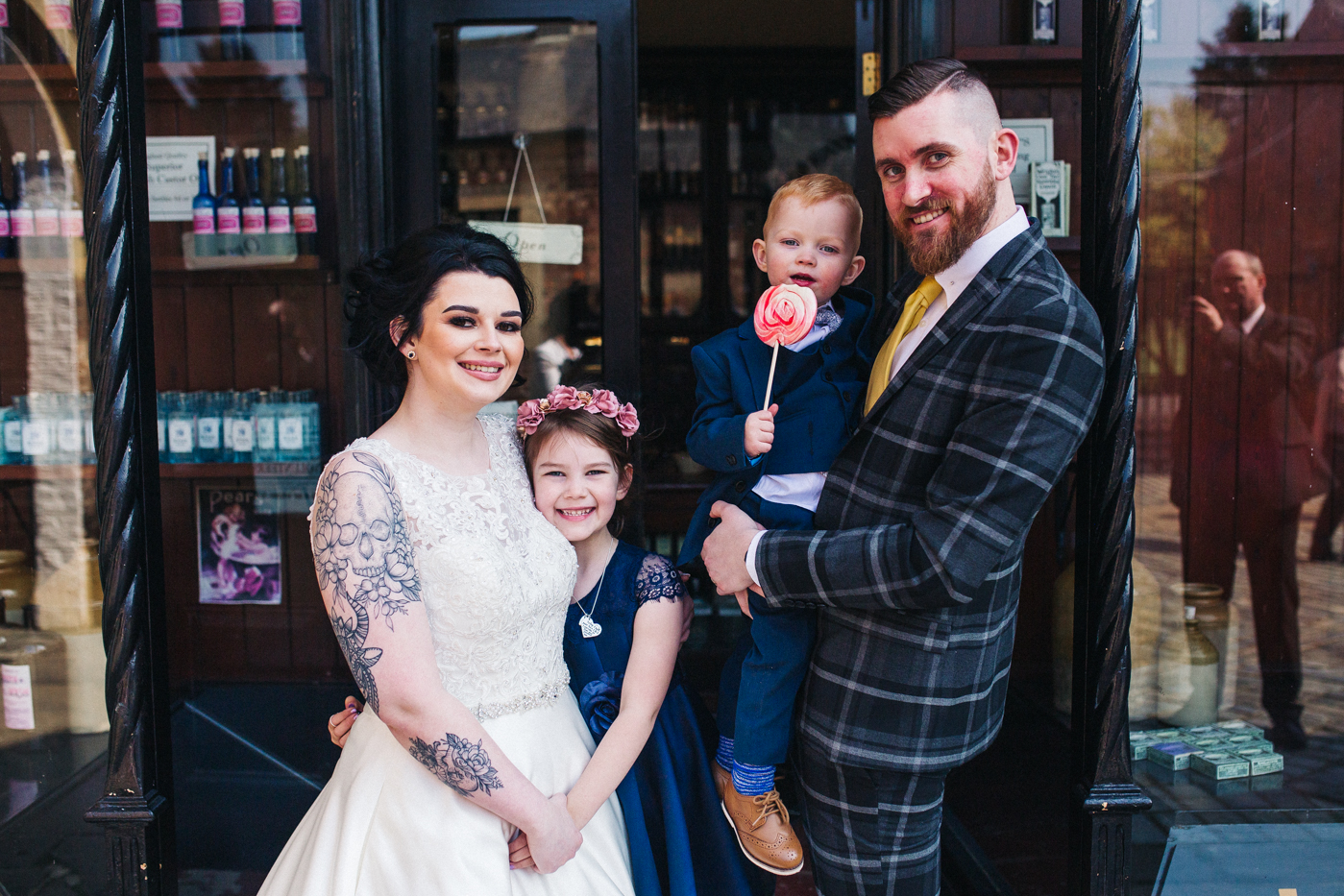 a family photo of the bride and groom with their two cgildren. preston park museum wedding stockton teesside middlesbrough wedding photographer