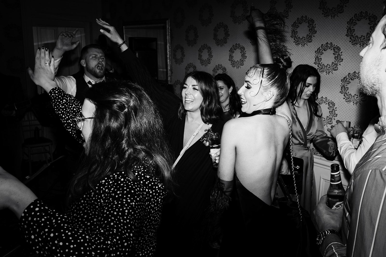 cool guests looking amazing dancing on the dance floor at toftcombs mansion house in Scotland