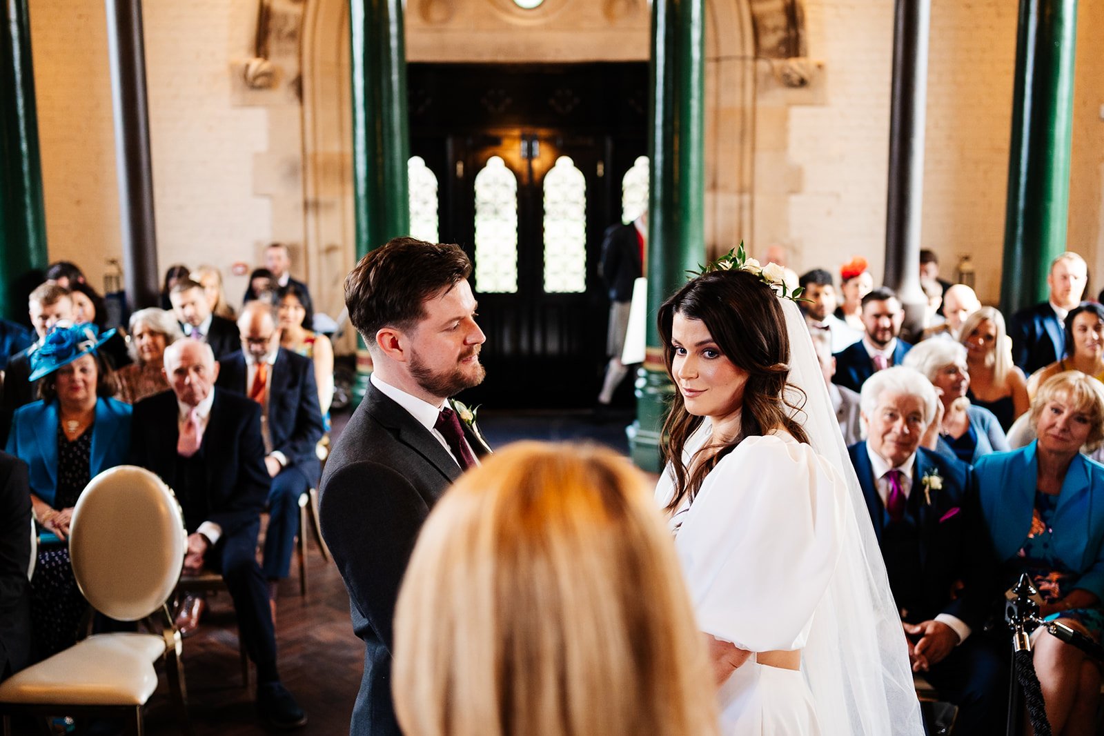 a shot from behind the registrar during the ceremony at the dalton old pump house