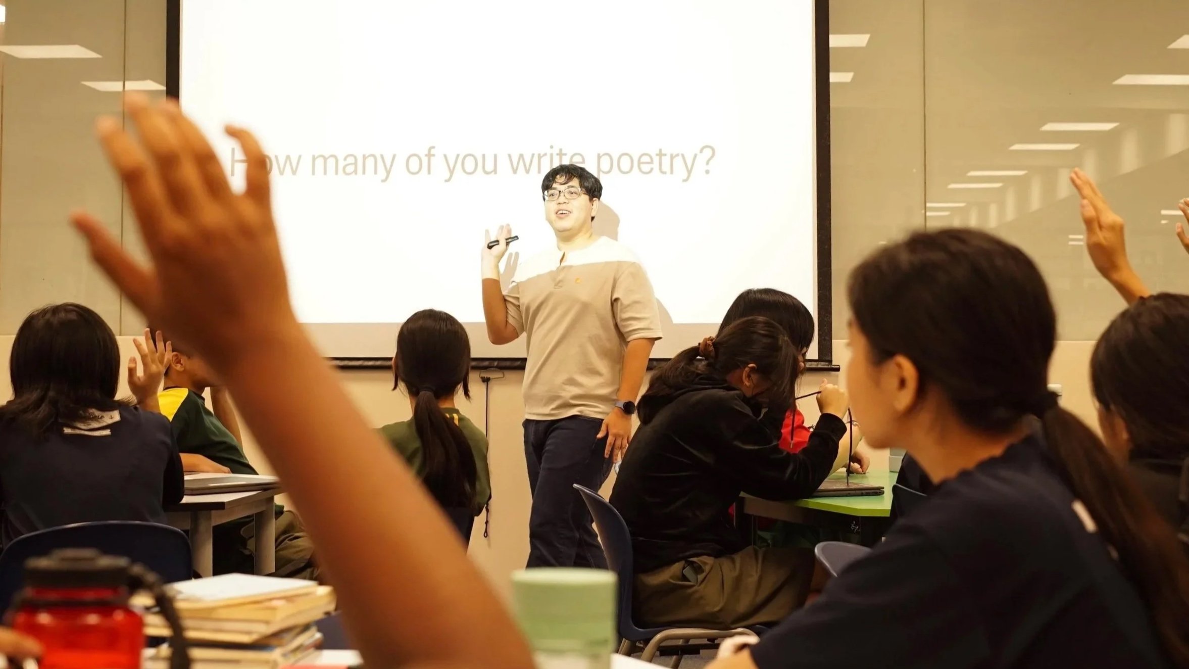 Students participating in a creative writing workshop in Singapore