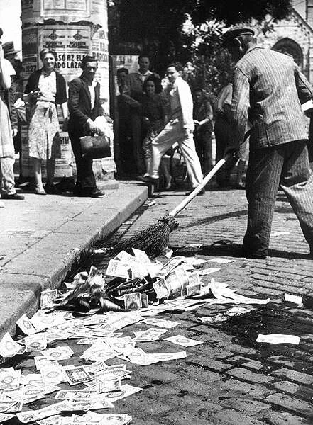 What is the opposite of this? Sweeping up in 1946 after the hyperinflation of the Hungarian pengő. Source: Wikimedia Commons, Magyar Nemzeti Múzeum Történeti Fényképtára, Budapest.