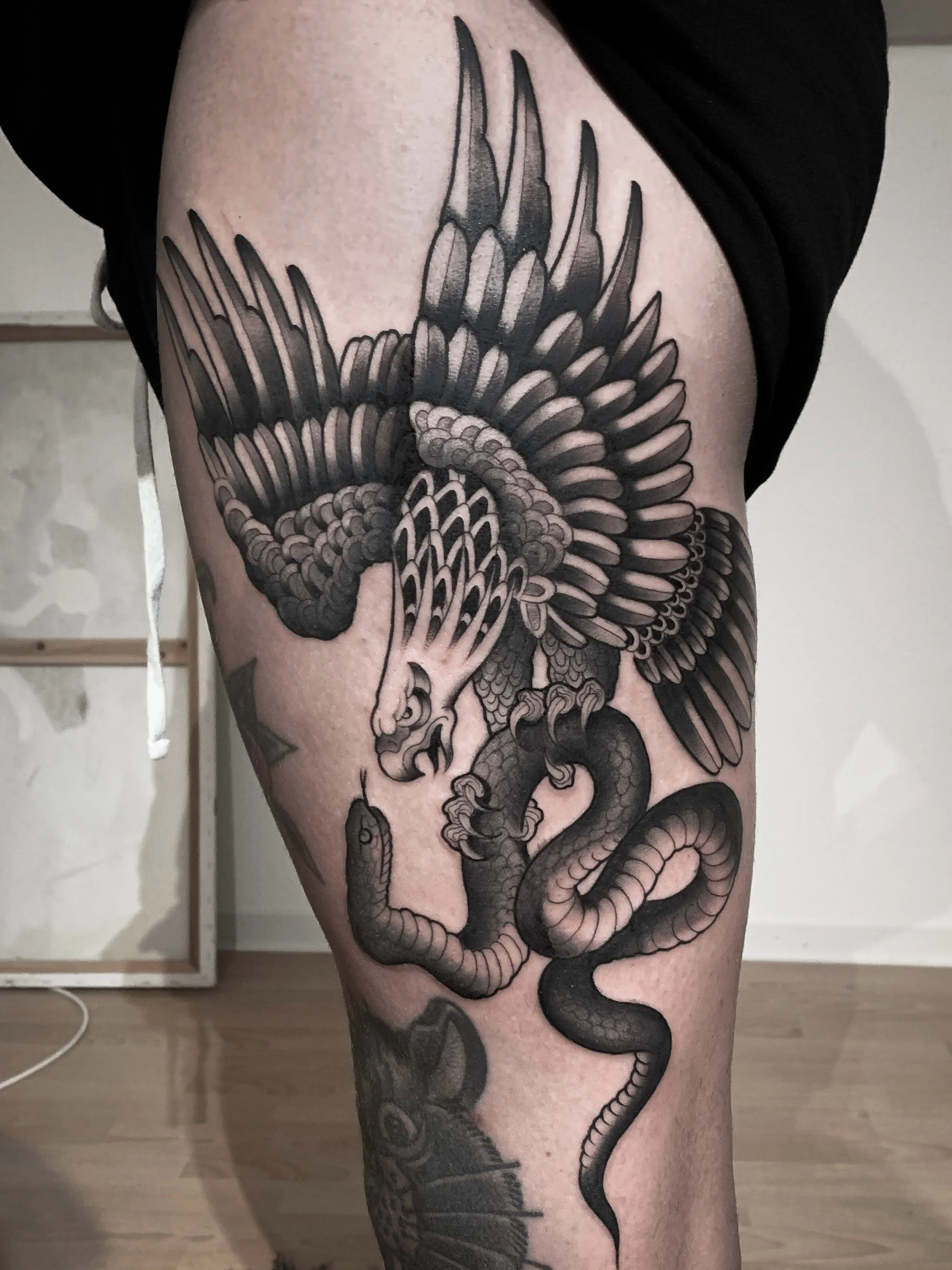 christian-otto-traditional-blackwork-snake-vs-eagle-los-angeles.JPG