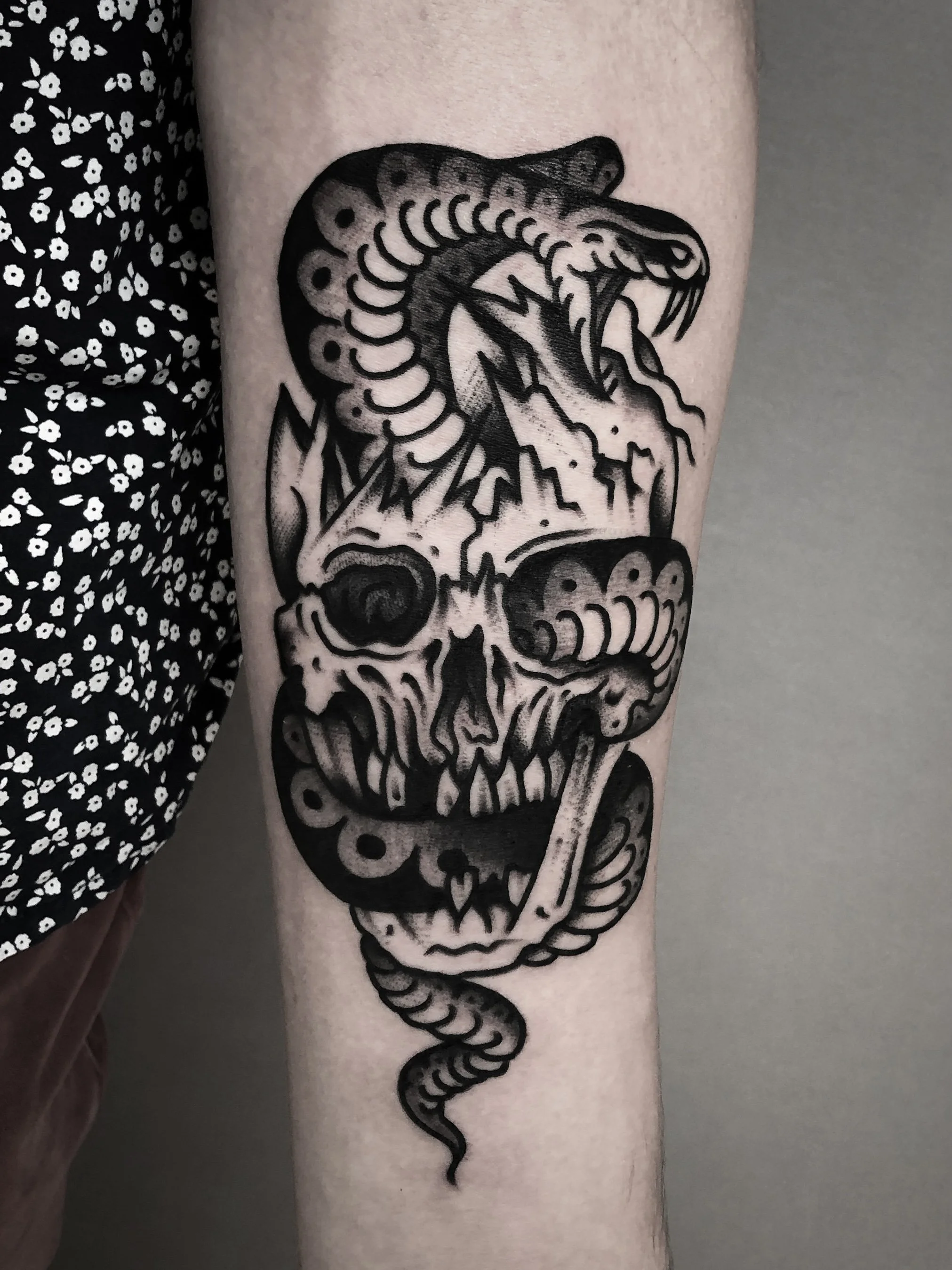 christian-otto-traditional-black-and-grey-snake-and-skull-tattoo-los-angeles.jpg