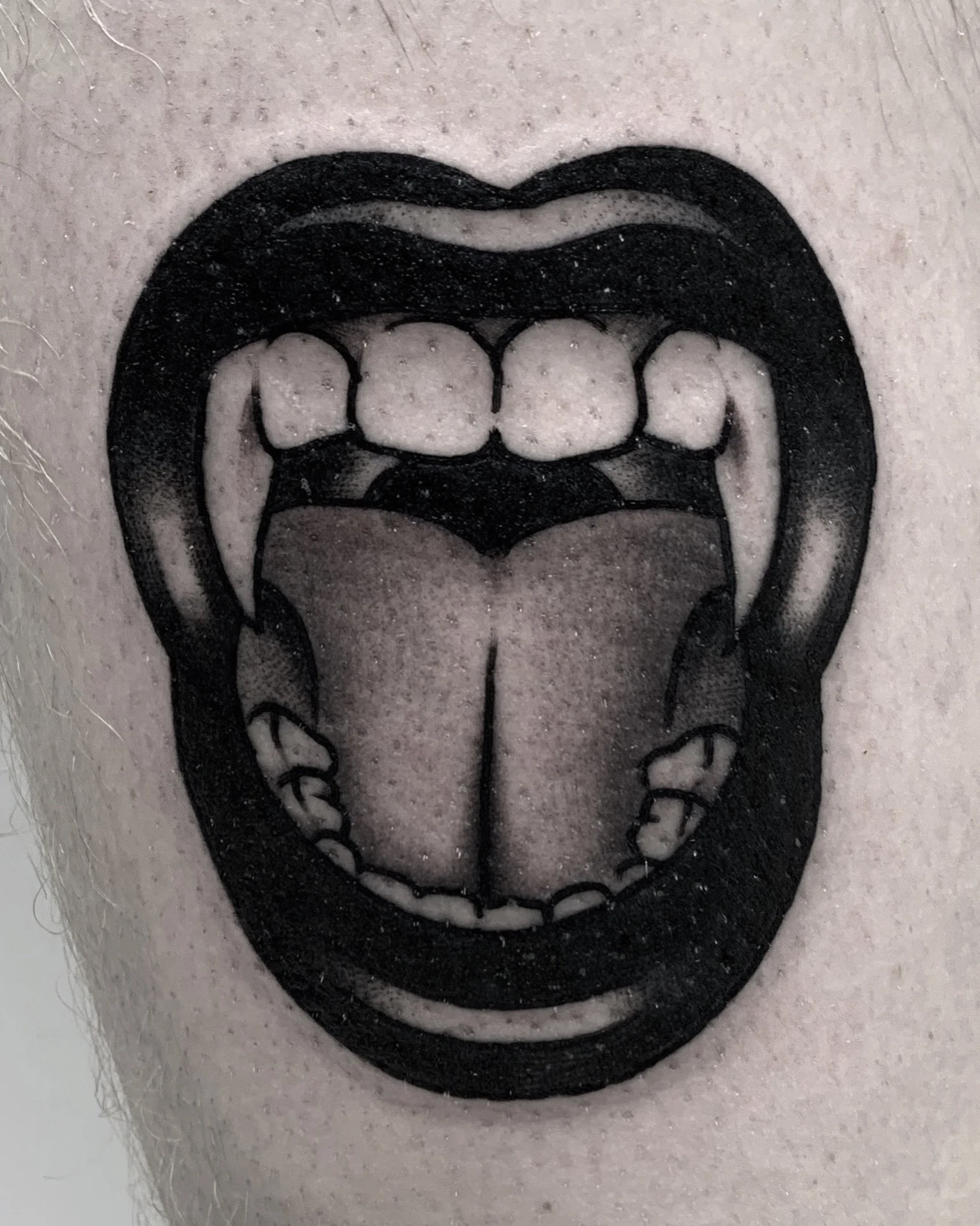 christian-otto-traditional-blackwork-vampire-mouth-tattoo-los-angeles.jpg