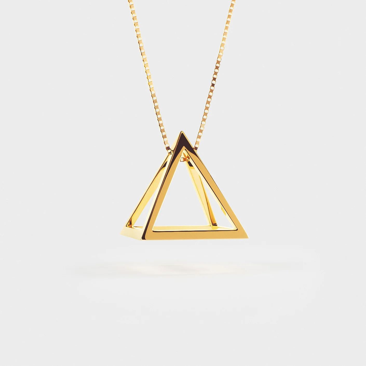 IVAN_GOLD_PYRAMID_HANGING.jpg
