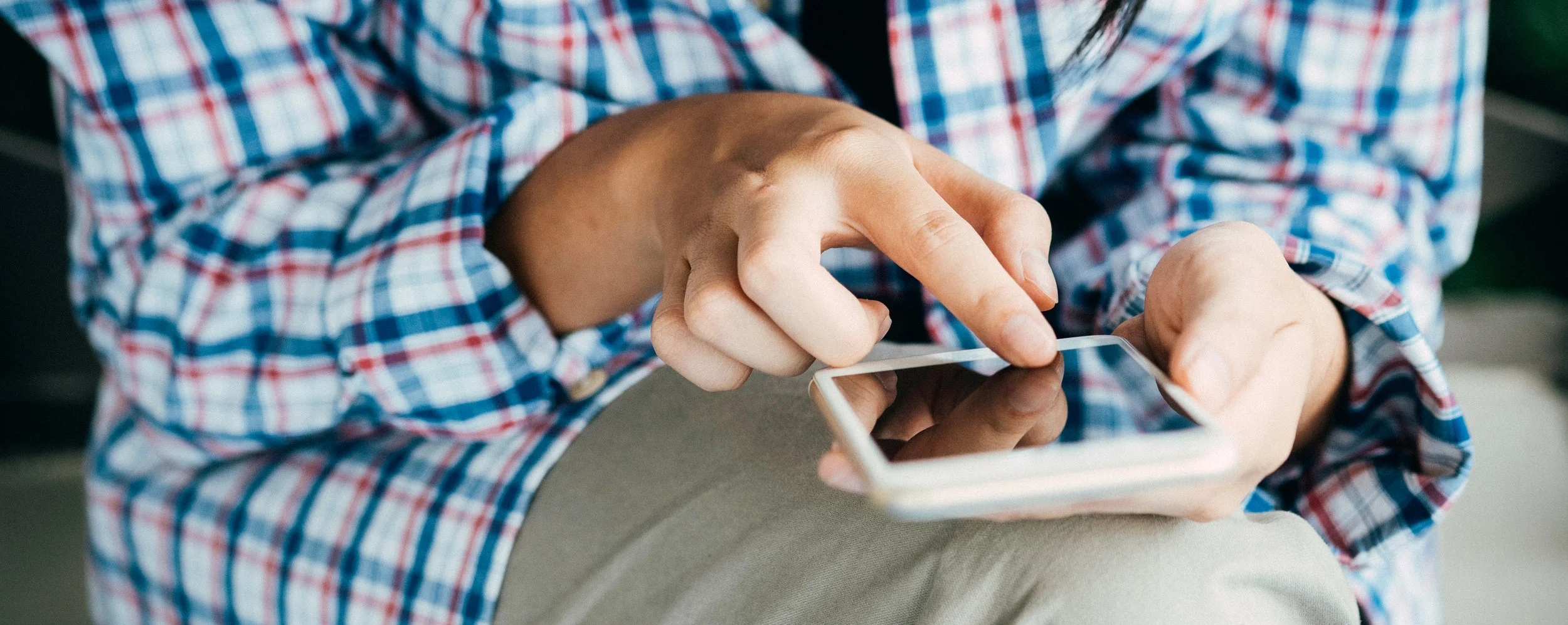 Checking CGM data on an iPhone, image from pexels.com.