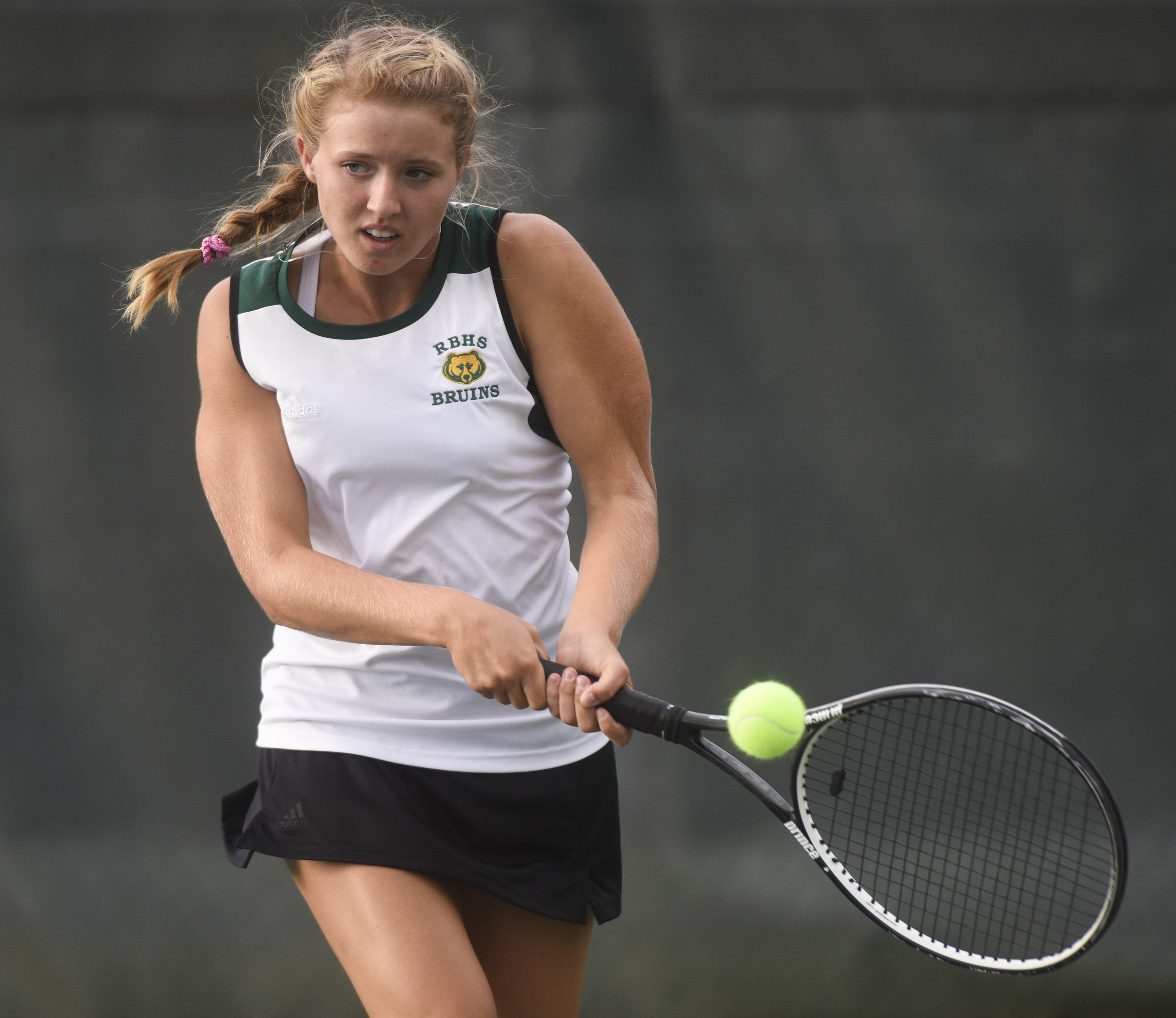 Sophomore Corinne Farid returns the ball during a match against Hannibal High School on Tuesday, Sept. 26, 2017 at Cosmo-Bethel Park. Farid is ranked first at Rock Bridge and won her singles match without giving a point away.