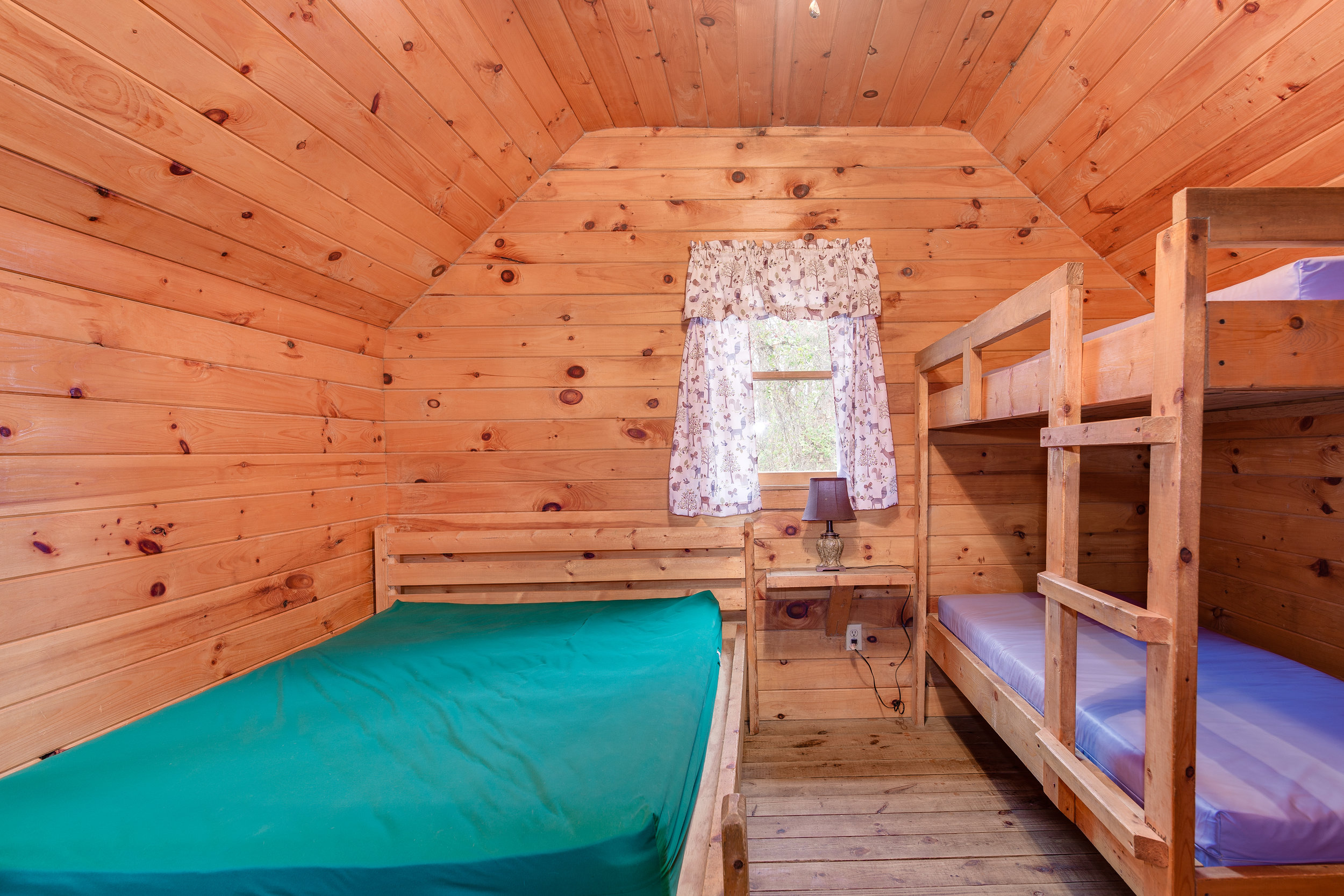 Full size bed and twin bunks in K3