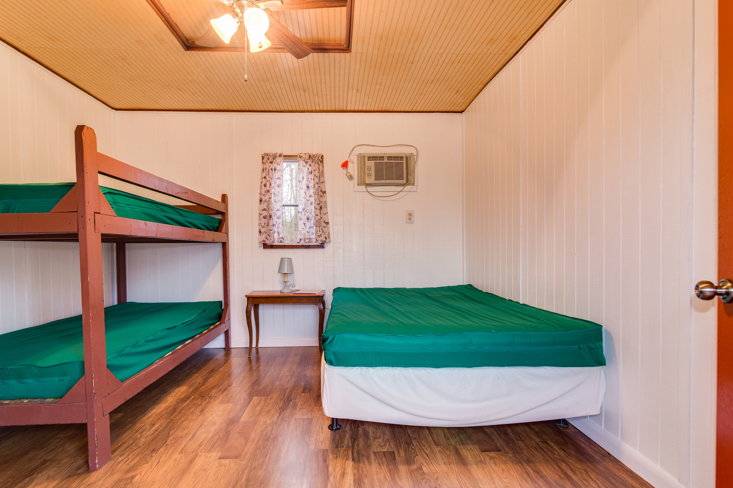 Full size bed and twin bunks in K2