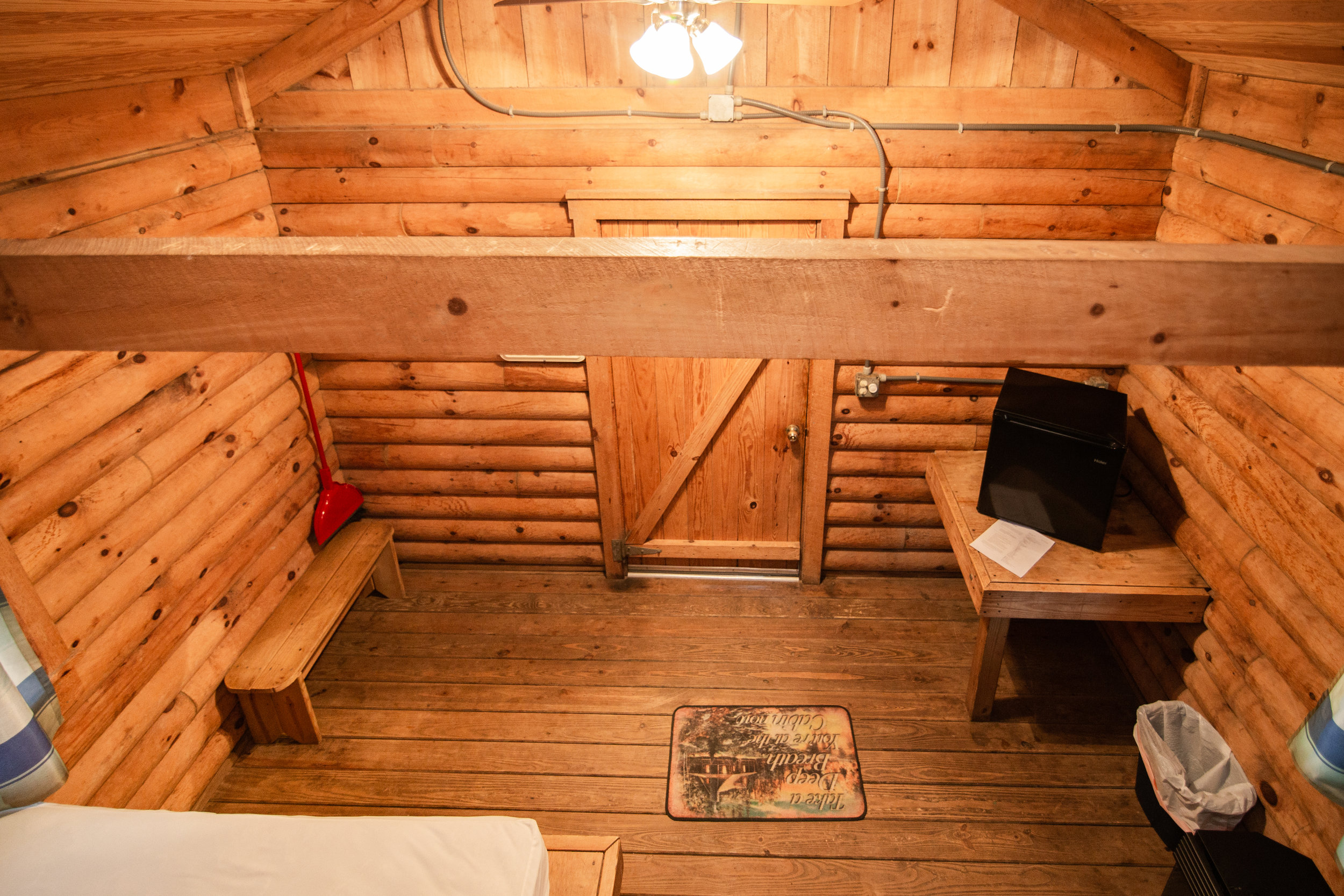  The view from the upper twin bunks of K4 is of the rest of the cabin, including the lower twin bunk and the queen size bed. 