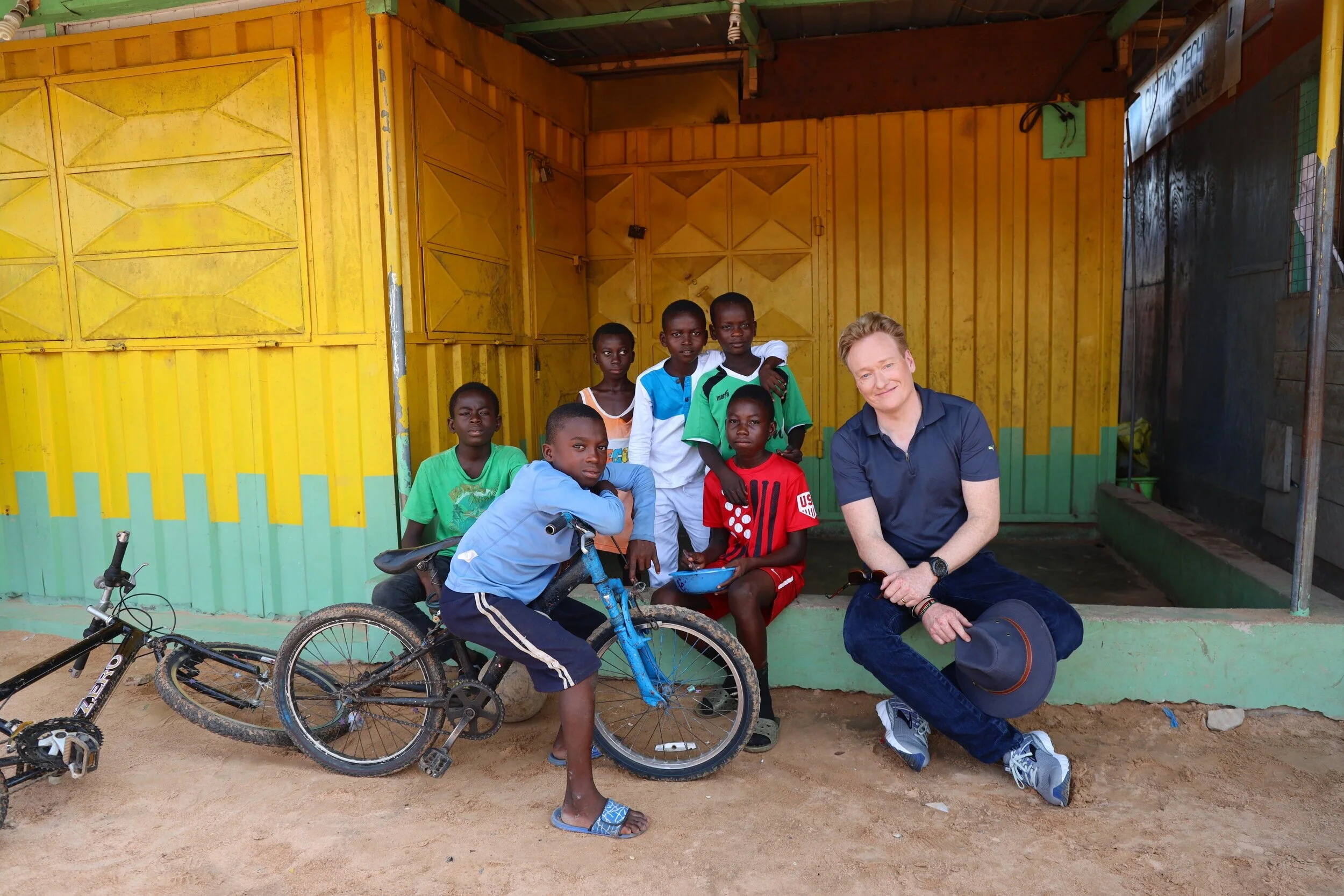  Conan O’Brien with local kids in Accra, Ghana | 2019 | photo by: Ruthie Wyatt 