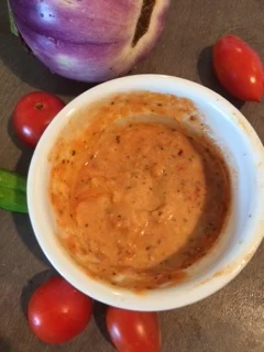Regular hummus mixed with pure tomato sauce and some herbs came together in about 45 seconds and became a delicious dip for our colorful veggies!
