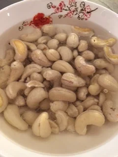 The cashews are getting a bath before go-time!