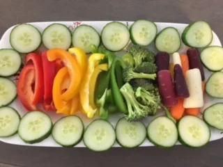 Raw veggies are crunchy, colorful, and convenient little vehicles to get dips into little mouths. :-)