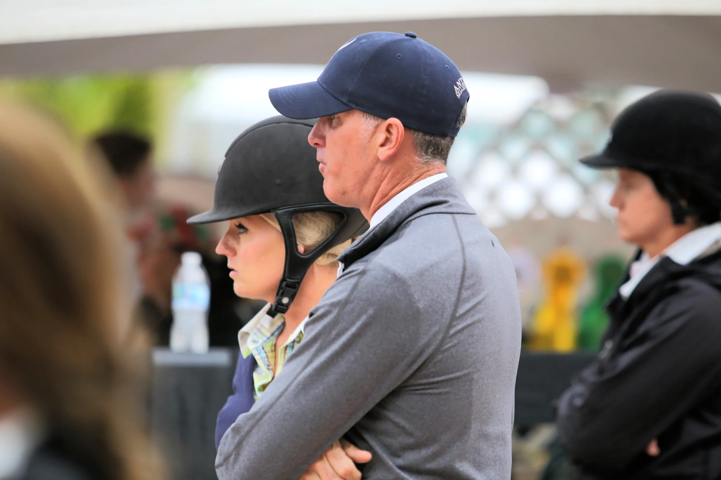  Freddie and Jodi Vazquez watch their student's round at the Winter Equestrian Festival. Photo by Carrie Wirth