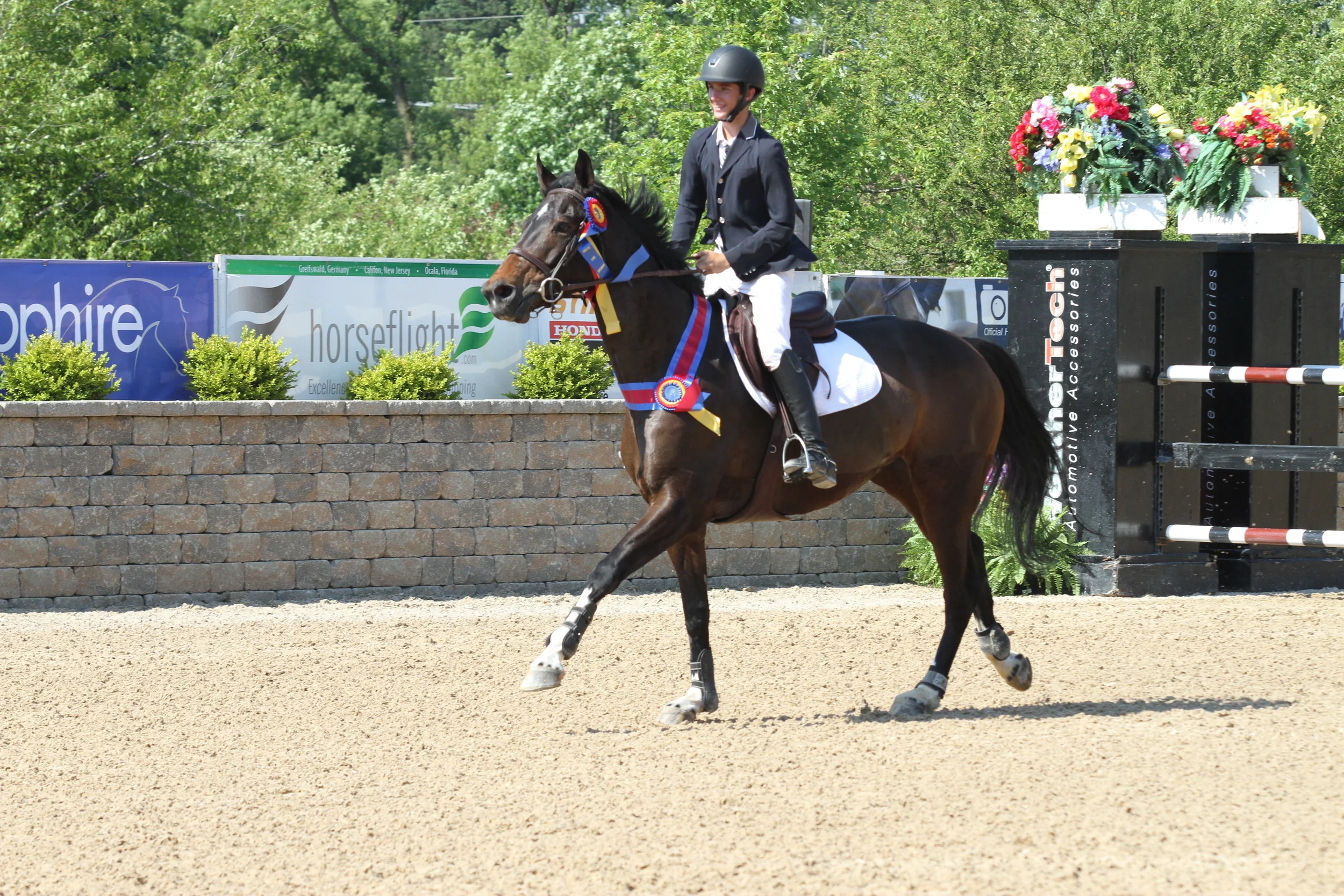 Kyle Perkovich takes his victory gallop