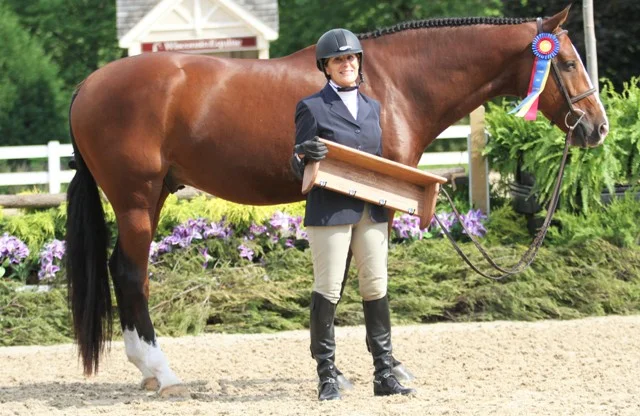$1000 Amateur Adult Hunter 50 & Over Champion Gameplan owned and ridden by Beth Bailey “He’s awesome. He’s super brave, he’ll jump anything,” said Bailey, who credits “Cooper’s” success to trainer Lynn Jayne and rider Kara Raposa. “He’ll look for the jumps, he’s always ready to go and he has a lot of scope. I’m lucky to have him, my ‘Super Duper Cooper’.”