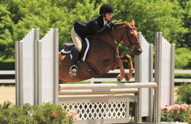 Photo courtesy of Andrew Ryback Photography Large Pony Division Champion Jessandi Famous Amos owned and ridden by Olivia Stoeckel