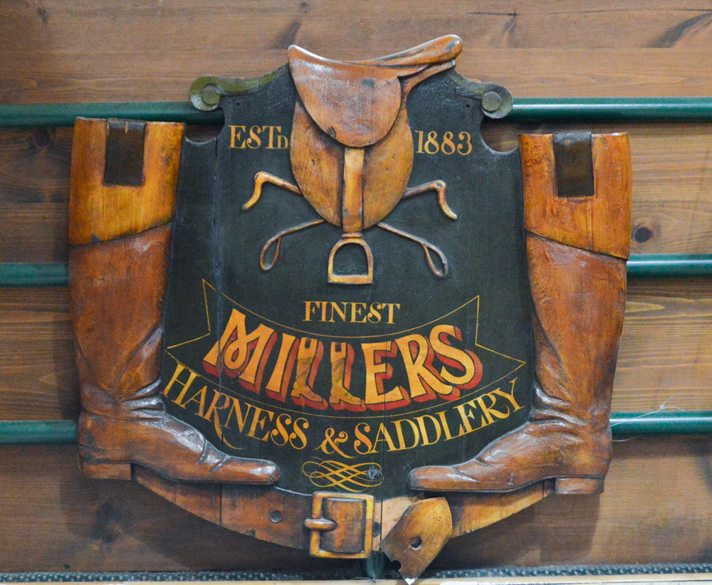 The original Miller's sign. Photo courtesy of Manhattan Saddlery.