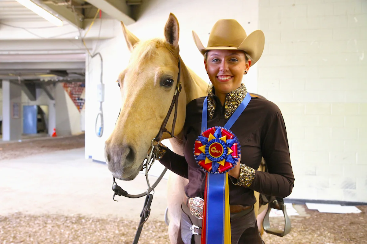 Morgan Knerr and Brie, owned by Karen Black, won the IHSA 2018 NRHA Individual Open Reining championship. Photo by EQ Media