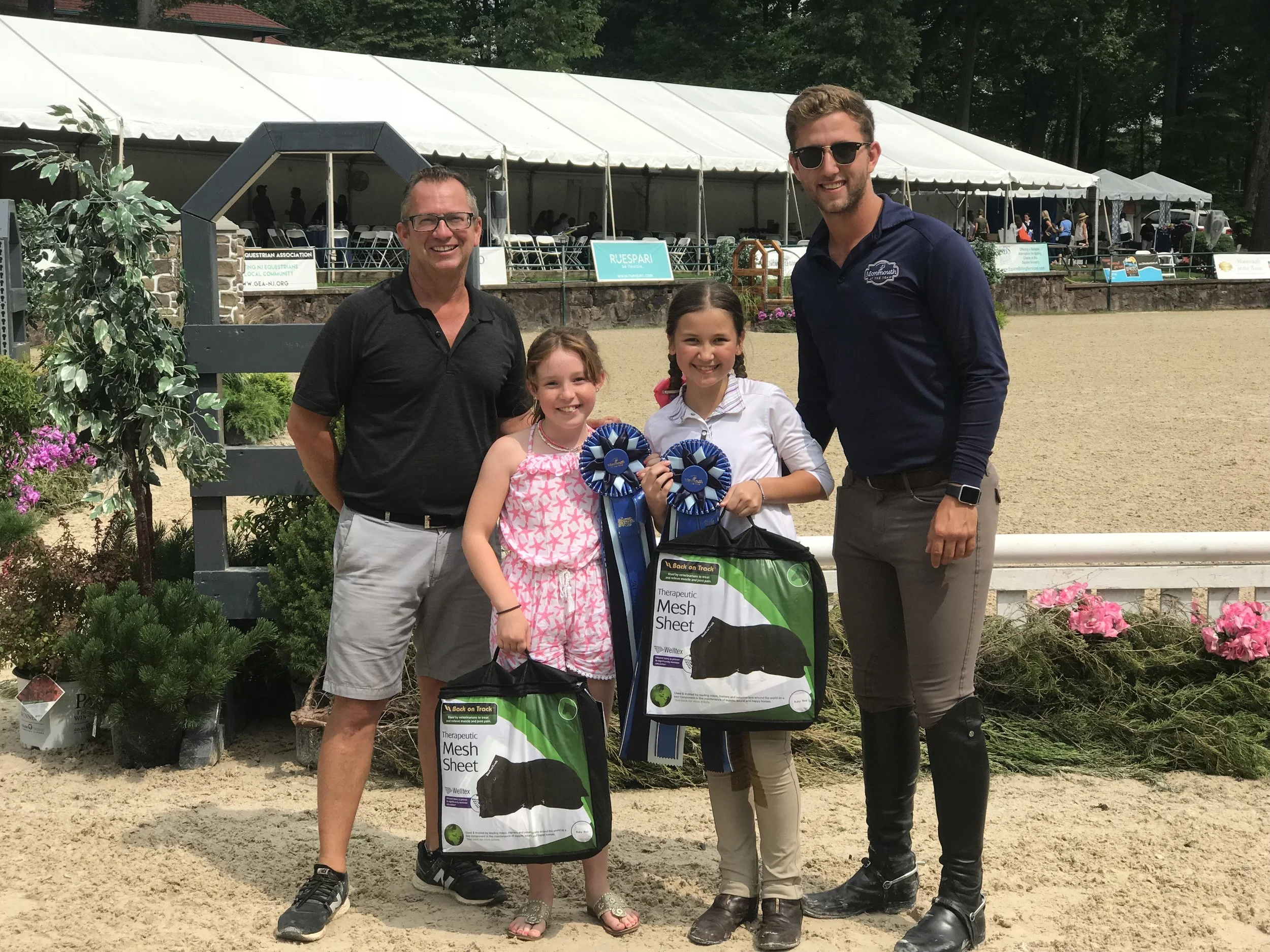 The judges presented Grace Sameth the Top Trip of the Day Award, sponsored by Stal de Eyckenhoeve. Jordan Rupich earned the Style of Riding Award, sponsored by Le Fash. Back on Track Therapeutic Mesh Sheets were awarded to the two riders. Both riders train at Windham Hill with Michael Dowling and Michael Meyers. Photo courtesy of Michael Dowling