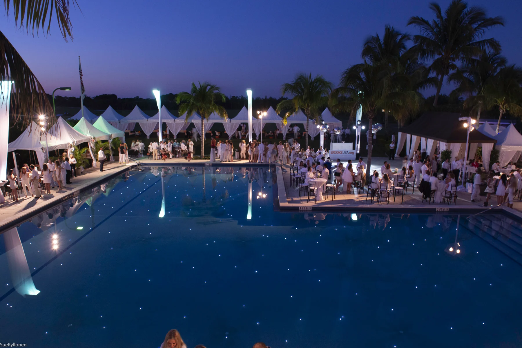 The cabana-lined pool set a beautiful stage for Brooke USA's Sunset Polo™ & White Party. Photo by Sue Kyllonen
