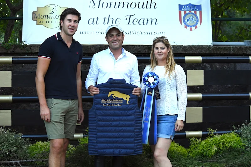 Niels Haesen and Maxime Tyteca from Stal De Eyckenhoeve presented Michael Desiderio with the award for the Top Trip of the Day. Photo by Anne Gittins Photography