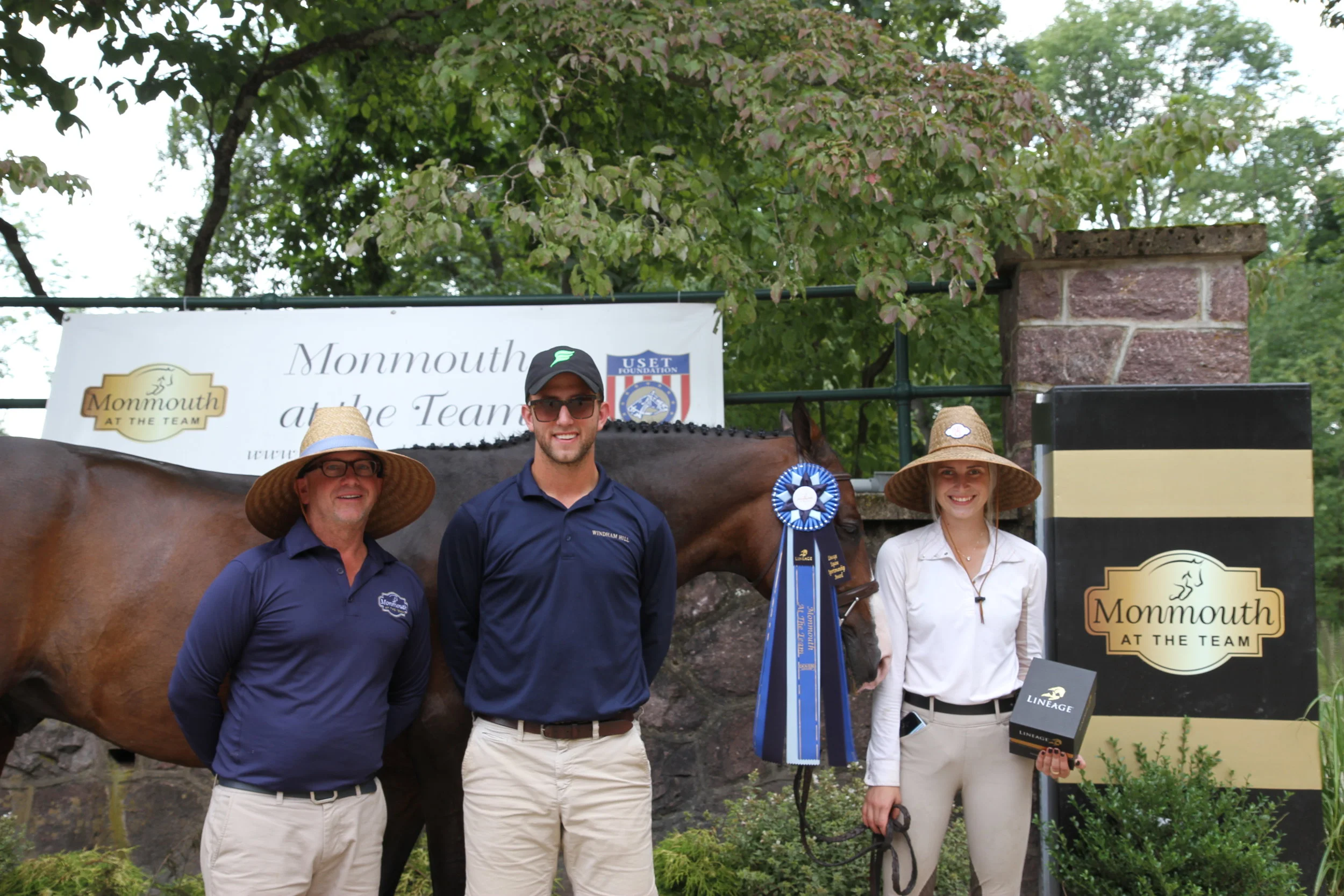 Madison Myro was presented with the Lineage Sportsmanship Award and went home with a new pair of Lineage stirrups. Myro accepted the award wiith her Windham Hill trainers Michael Dowling and Michael Meyers. Photo by EQ Media