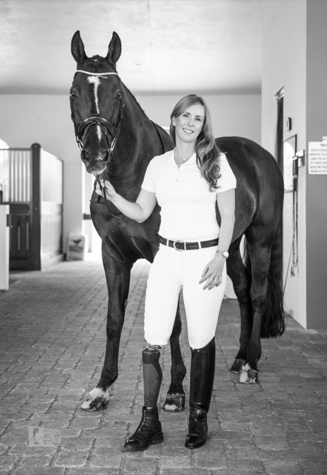 U.S. Para-Equestrian Dressage rider and cancer survivor Katie Jackson and her partner Diesel. Photo by Rachel Elizabeth Photography