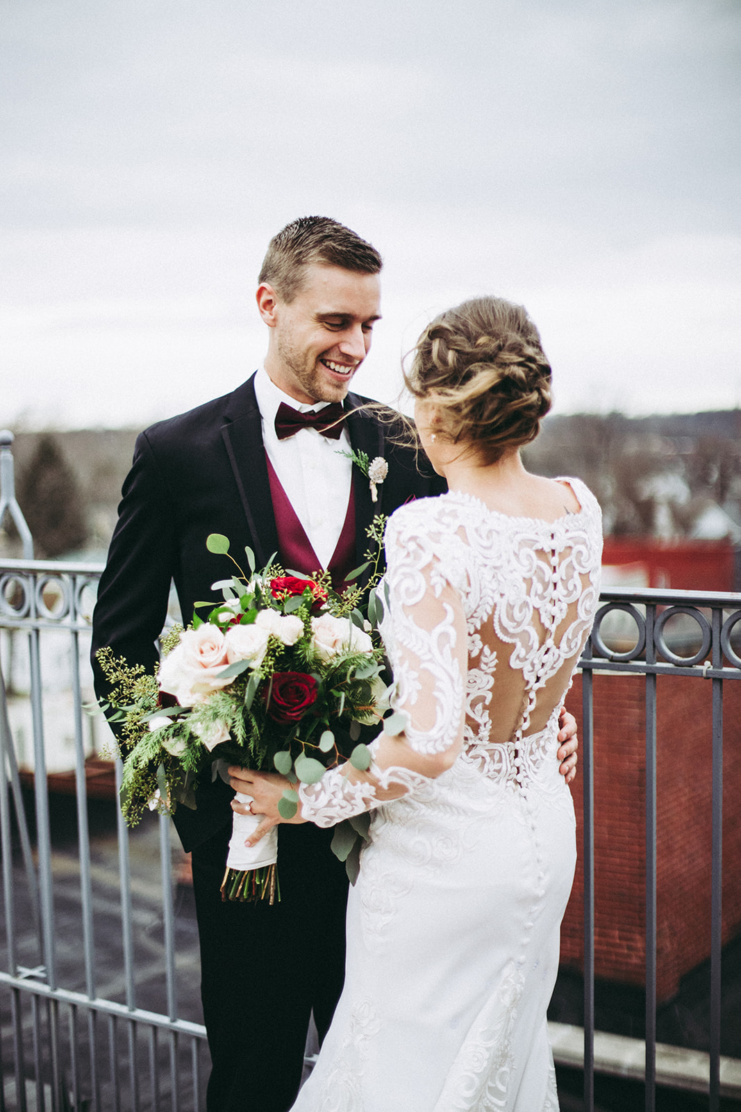 Bride and groom portrait on rooftop deck at Mill Top Banquet and Conference Center in Noblesville, Indiana