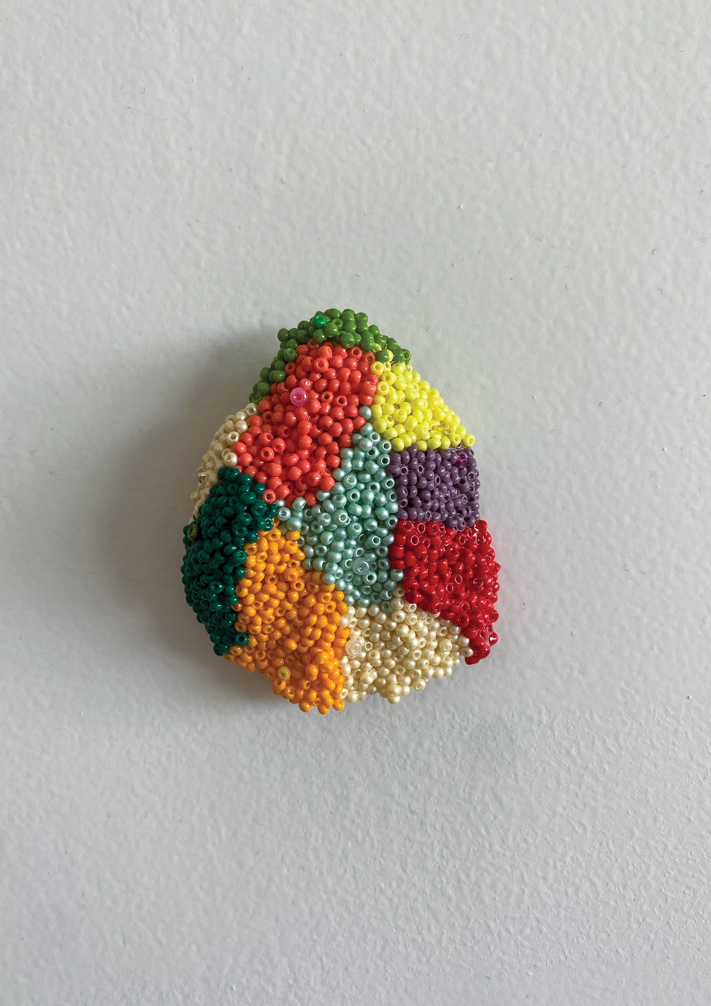 Tio, 2022, glass beads on oyster shell