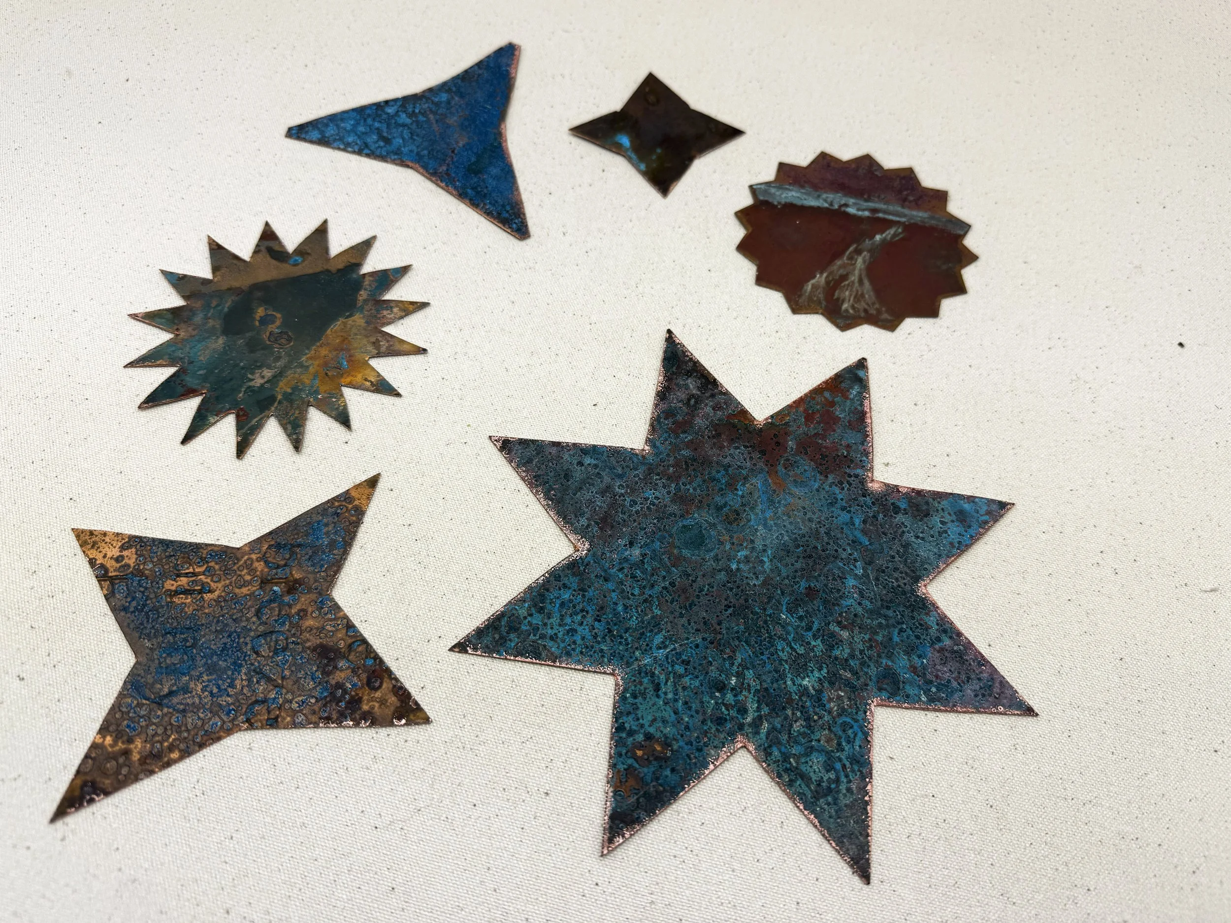Various Copper Stars, (patina)