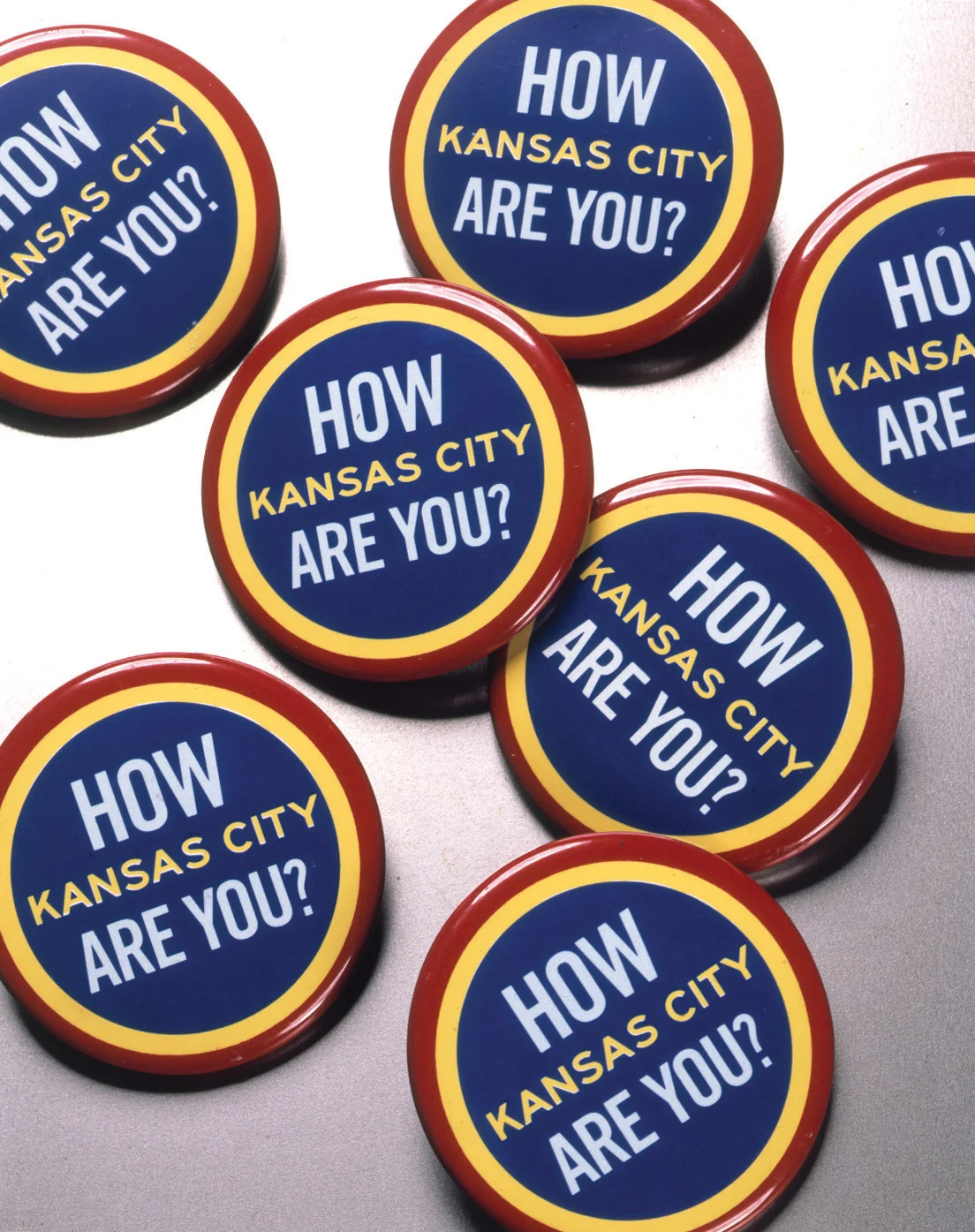 KCPL buttons.jpg