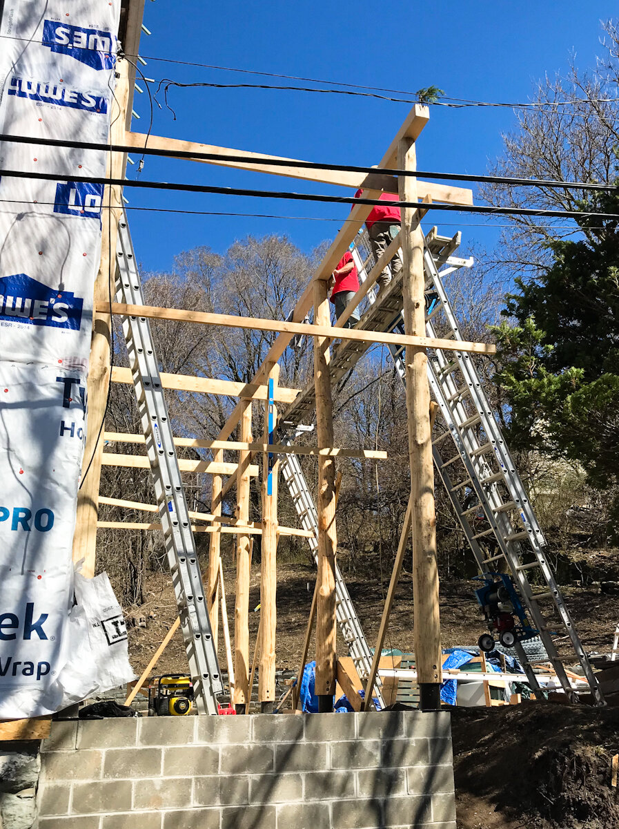 Installing the roof support beam timbers