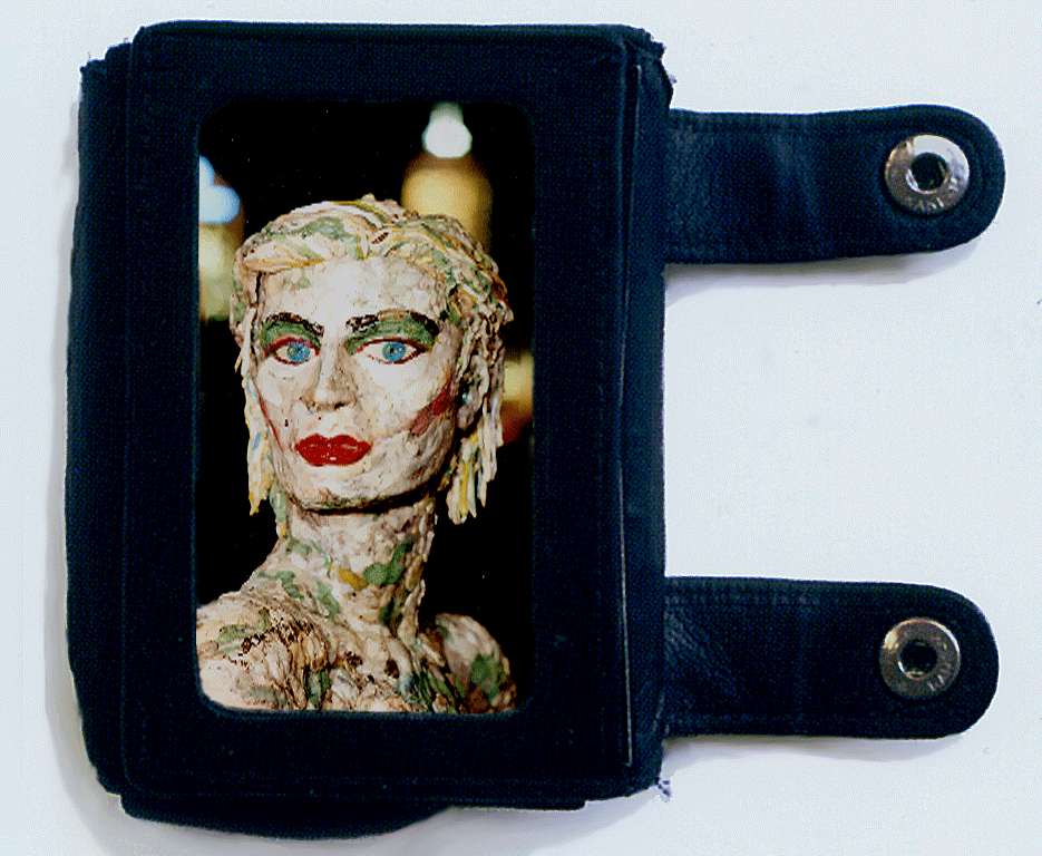 2003--im-in-love-with-everyone-and-everyone-is-in-love-with-me(-chewing-gum-girlfriend)--photo-in-wallet-of-to-scale-bust-of-'girlfriend'made-from-used-chewing-gum-scraped-off-the-streets.gif