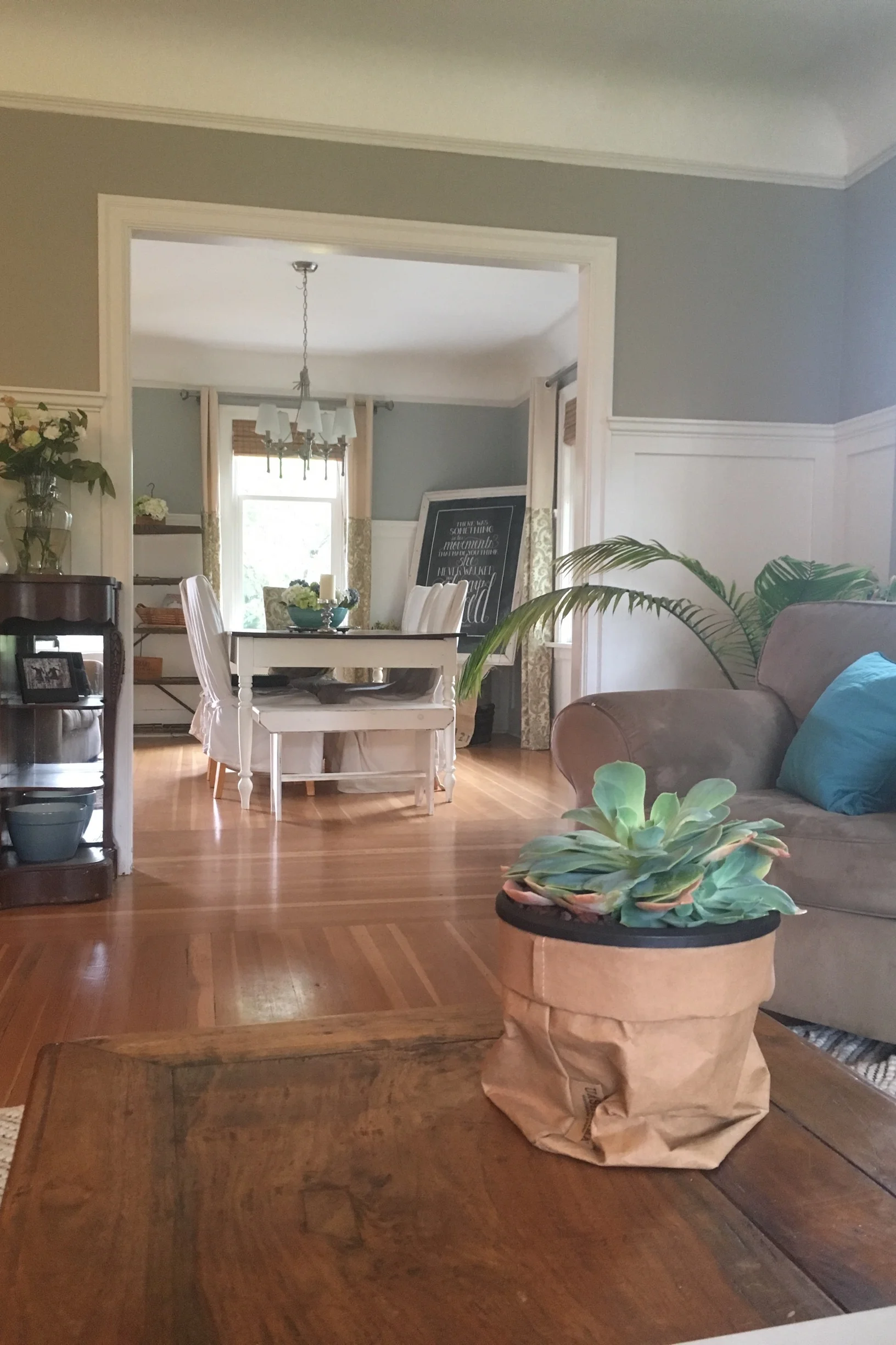 Working on a friends' project inspired me to update my own living room with a summer theme of layered blues and ombre paintings.