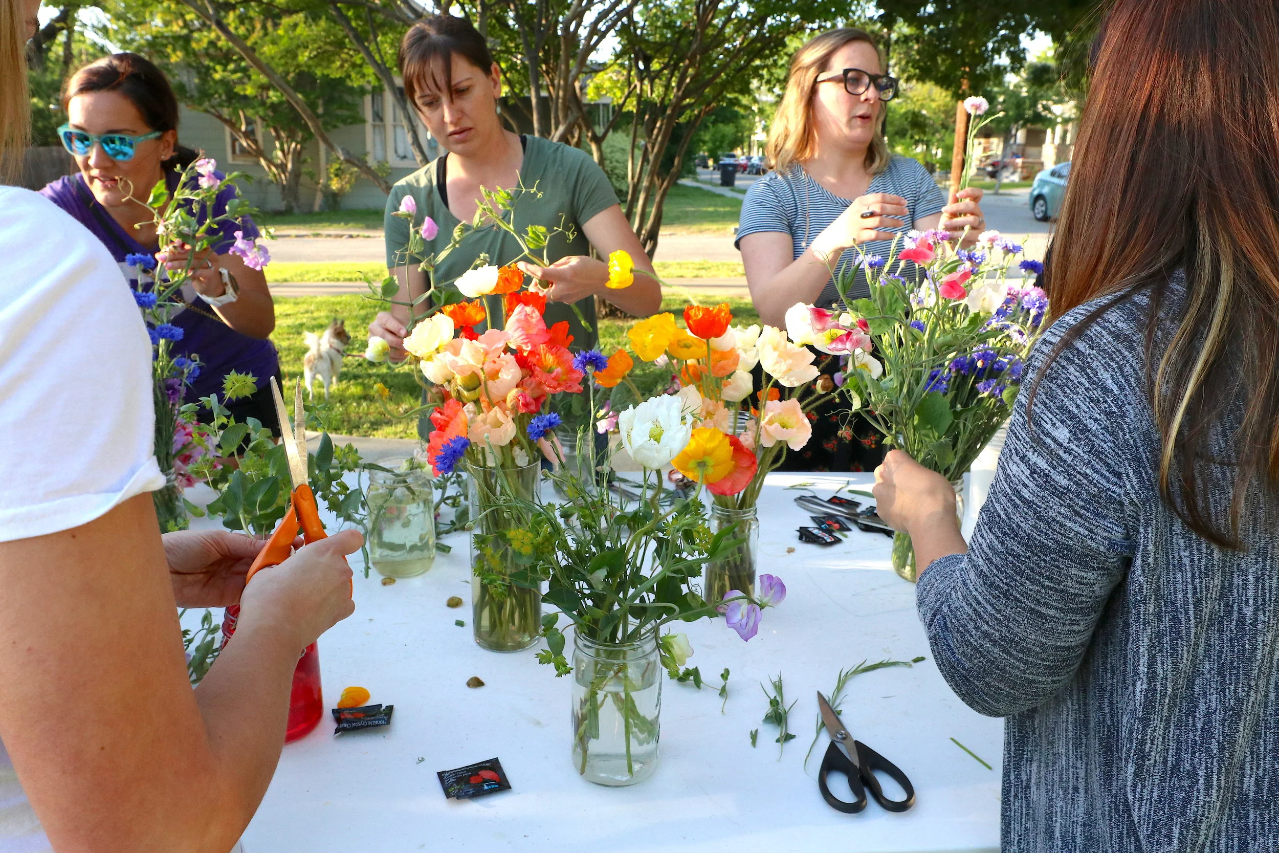  A group of Fairmount Neighborhood residents attend a floral arranging session hosted by Toon.  Photo by Sam Bruton  