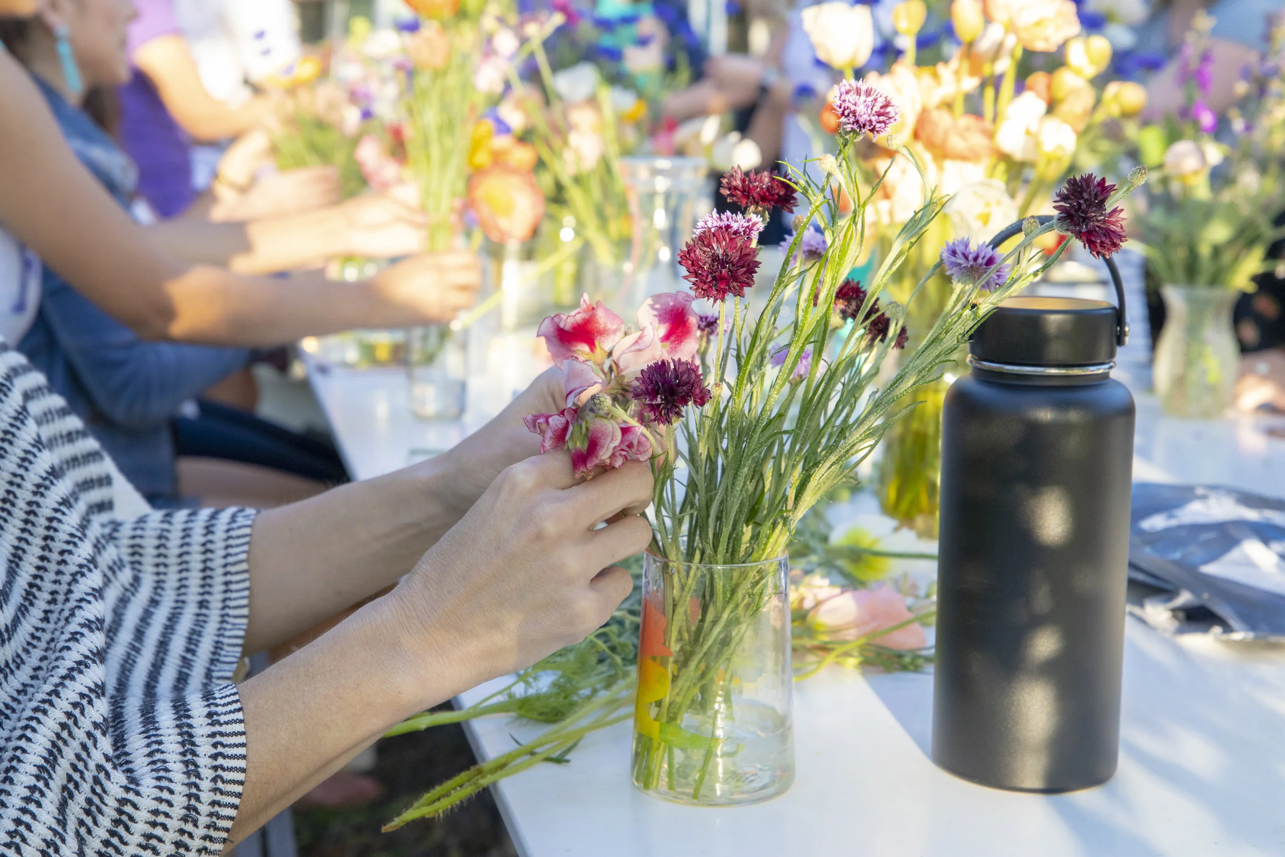  For $15, customers were able to bring their own vase and style it with flowers of their choosing.  Photo by Sam Bruton  