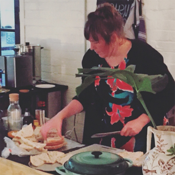 Isobel helps prepare lunch