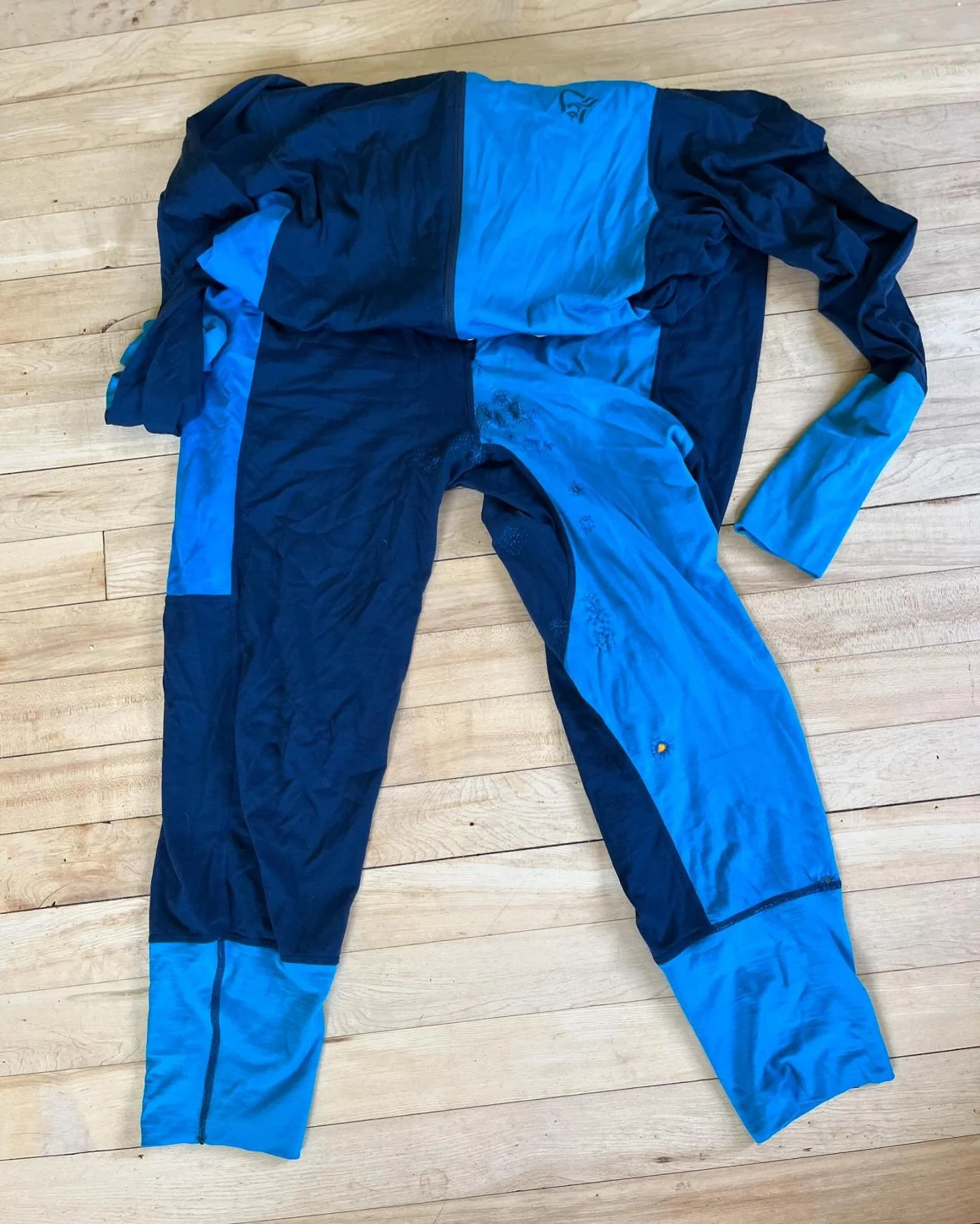 Some fun moth hole repairs on this lovely adult onesie! #ifitsbrokefixit #boltwestrepairwear #boltwest #boltwestrepairs #mending