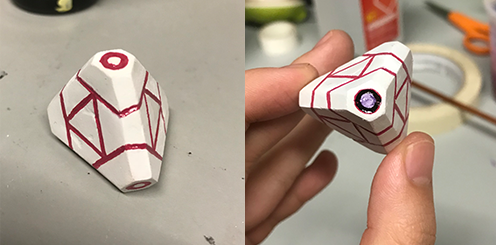 White droid made of paper clay + Copper droid made of pierced metal sheet.