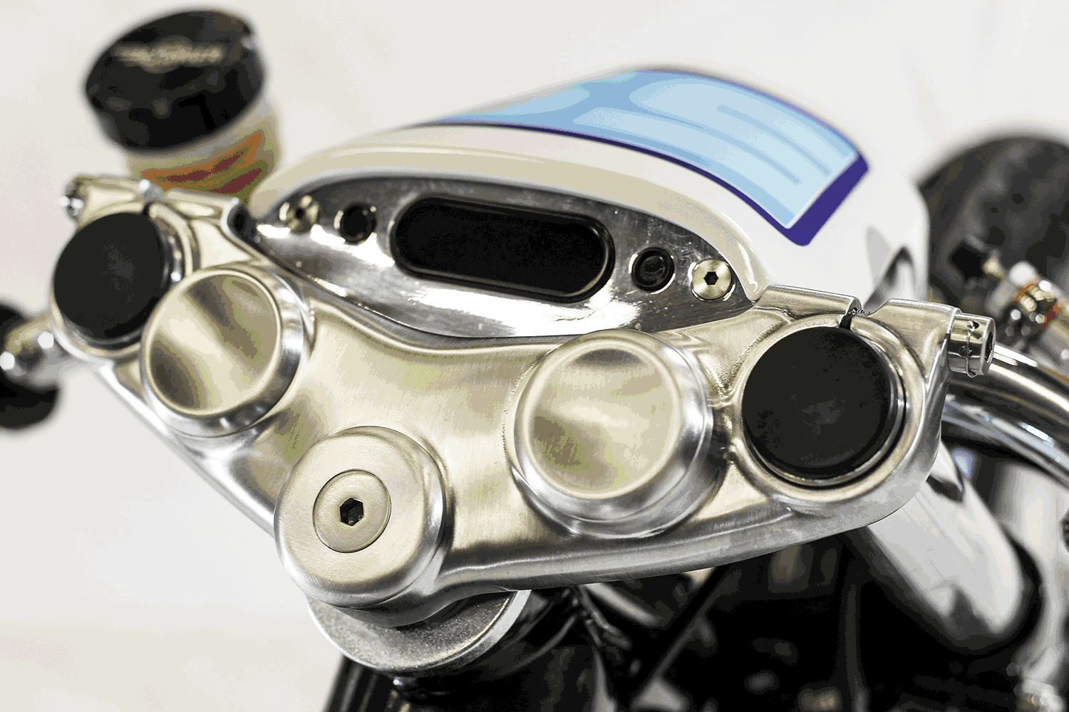 Tiny Motogadget dash sits in a sea of polished loveliness Below: Riders who Bernard worked with are listed on the tank Below right: From this side the bike looks beautiful, but conventional. On the other side lies insanity...