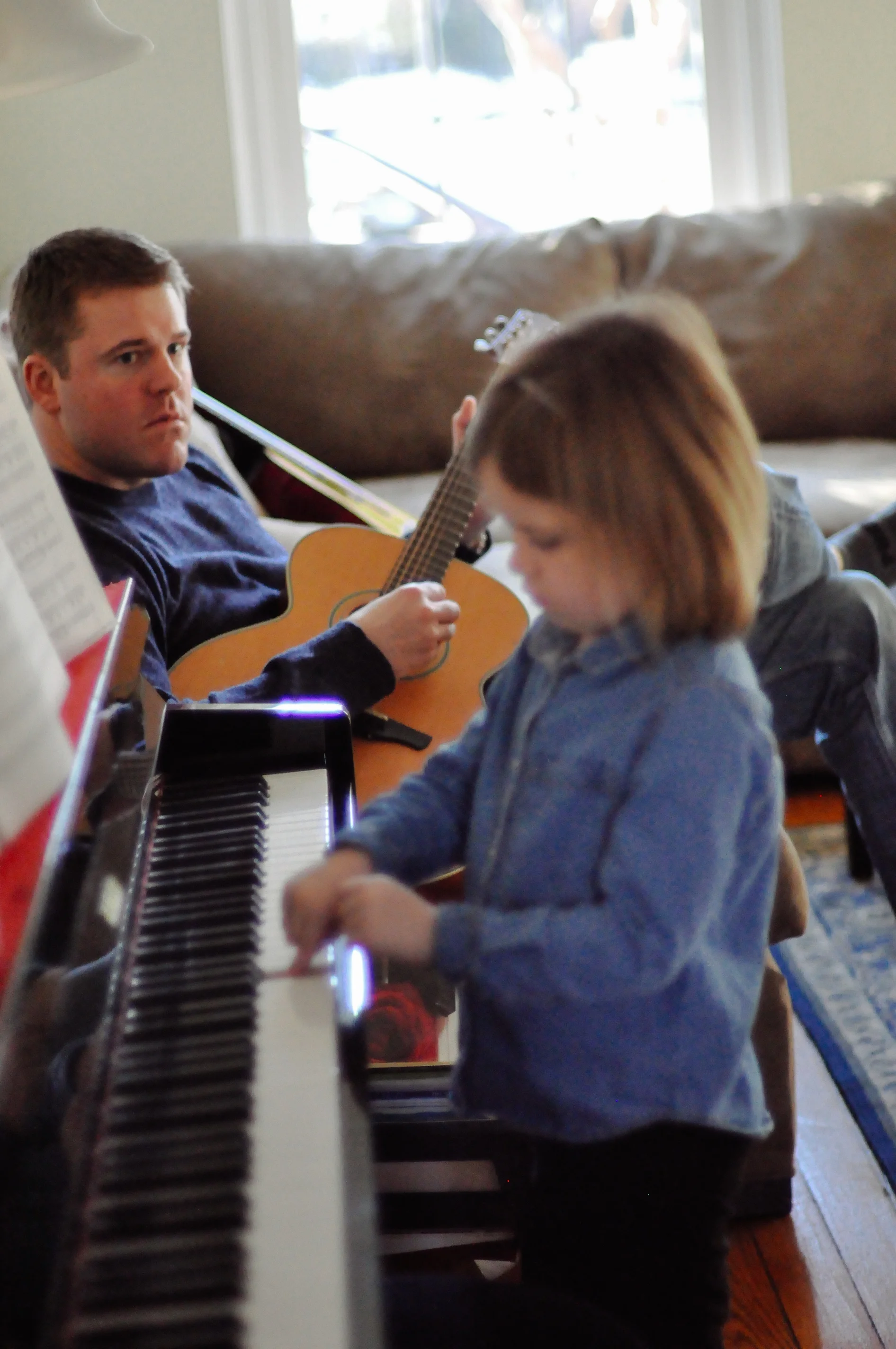 playing music with her dad