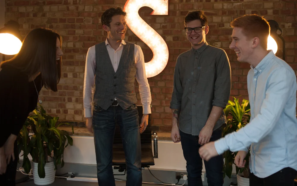 four-group-laughing-2.jpg