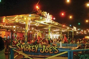 Aruba Restaurants - Smokey Joe’s Island Grill Outdoor Terrace on Bustling Palm Beach, Aruba