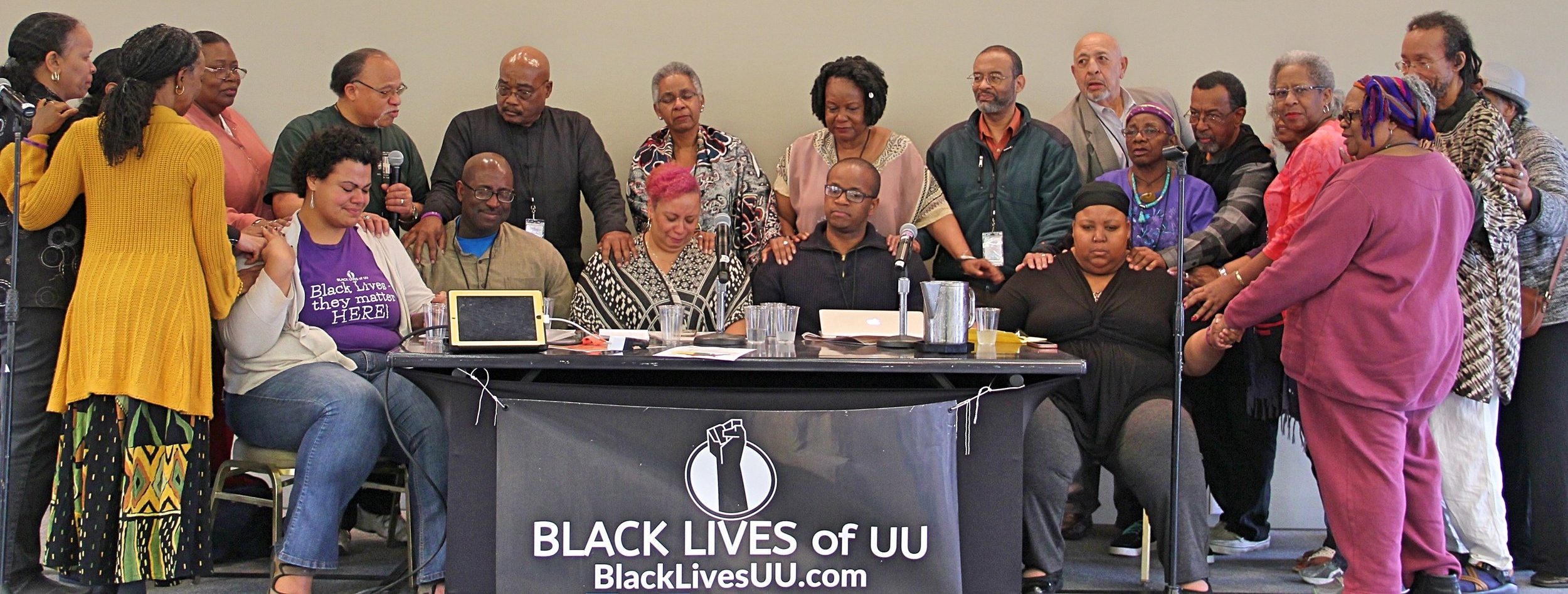 Black UU Elders lay hands and pray over the BLUU Organizing Collective in New Orleans, LA - February 2017