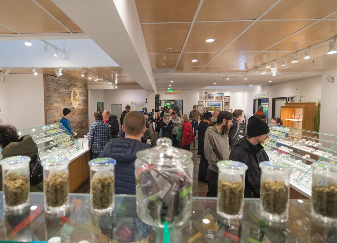 Peoples crowd the interior of KindPeoples location at 140 Dubois Street in Santa Cruz, excited to do their first fully legal cannabis shopping.