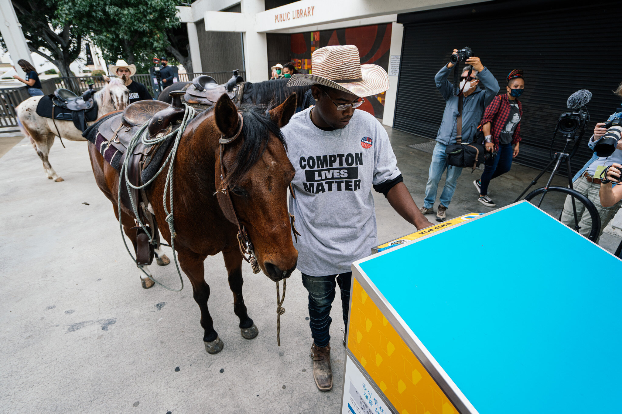  The Compton Cowboys ride to the City of Compton Public Library ballot box on October 25, 2020 to cast their ballots. 