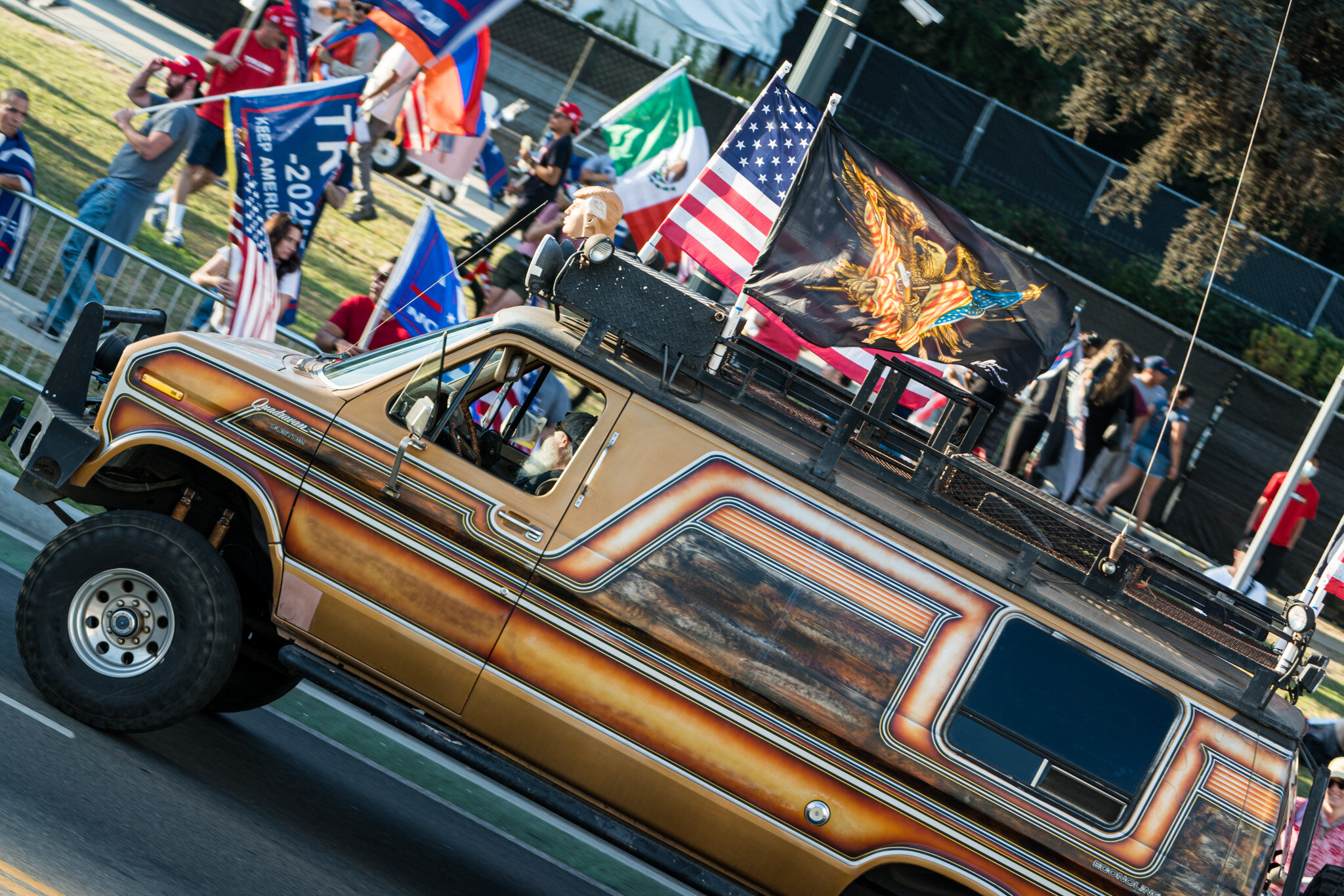  With just over twenty-four hours until election day, Trump supporters assembled in Beverly Hills, California on 11/1/2020. The group stationed themselves on Santa Monica Boulevard, and then proceeded to march down Beverly Blvd. and Rodeo Drive to sh